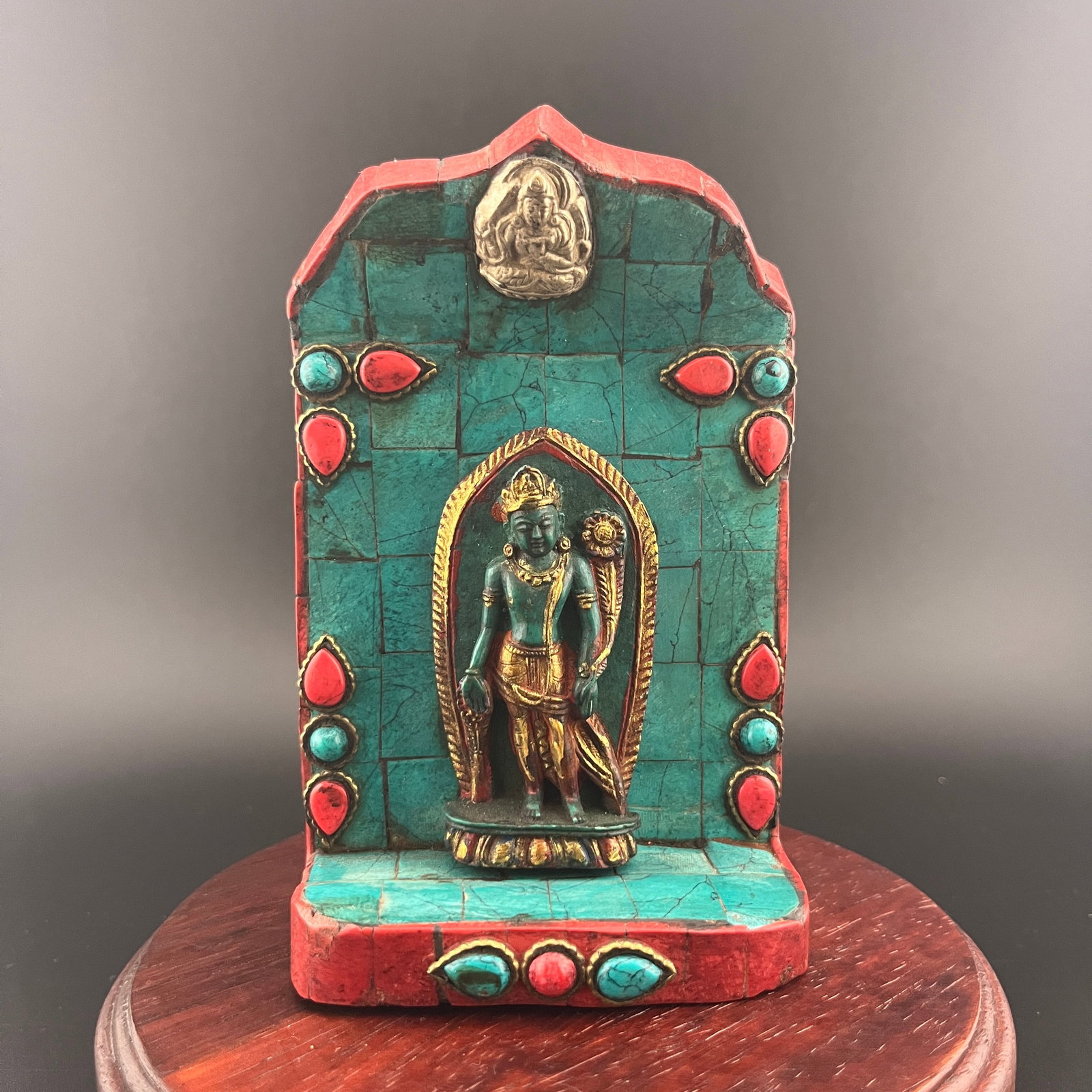 TIBETAN PORTABLE FOUR ARMED AVALOKITESHVARA WITH TURQUOISE AND CORAL