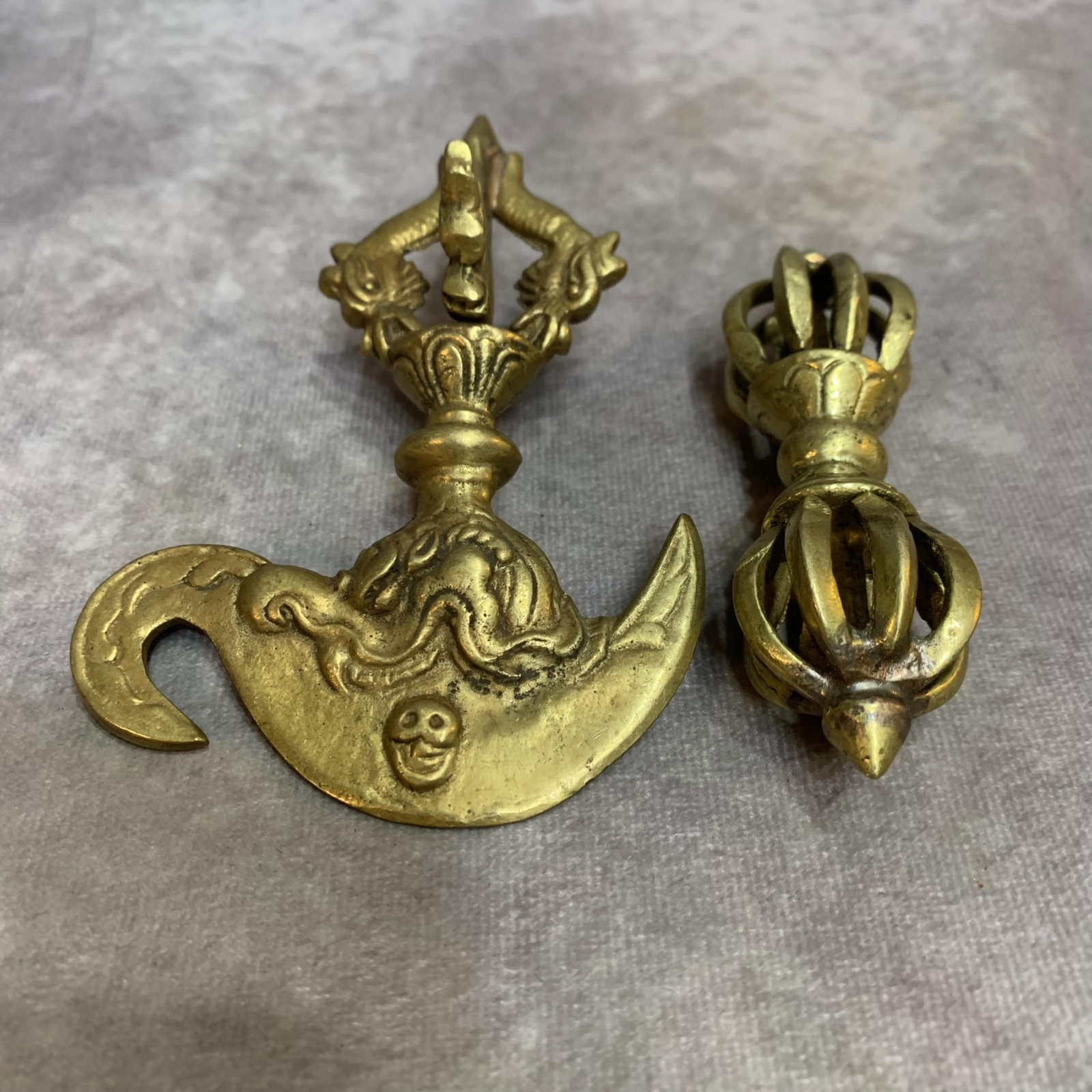 A GROUP OF TWO TIBETAN BUDDHIST RITUAL IMPLEMENTS