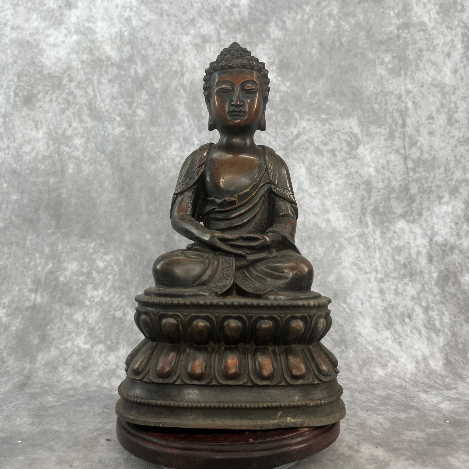 A FINE BRONZE SHAKYAMUNI BUDDHA STATUE: Ming Dynasty Style; Long: 5.2 inch; Width: 4.1 inch; High: 9.1 inch; Wooden base for diplay only