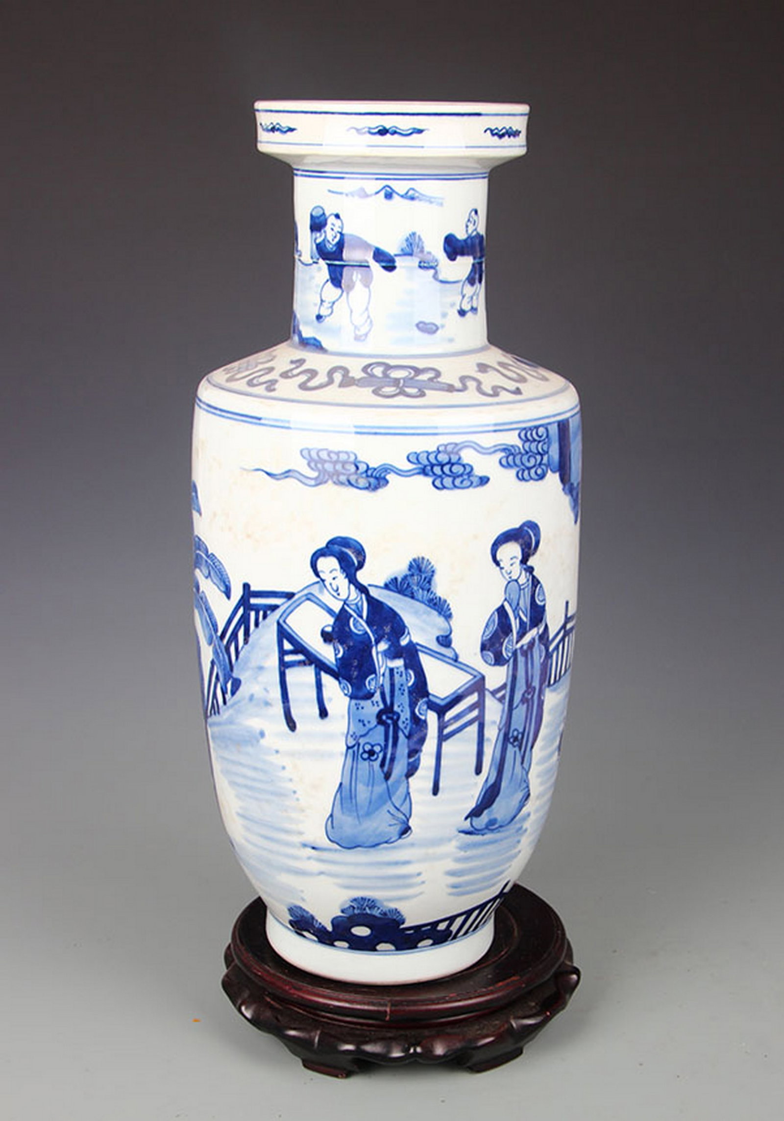 A BLUE AND WHITE FIGURAL NARRATIVE PORCELAIN VASE: Qing Dynasty Kang Xi Period; High: 16.25 inch; Diameter: 4.75 inch; Wooden base for diplay only