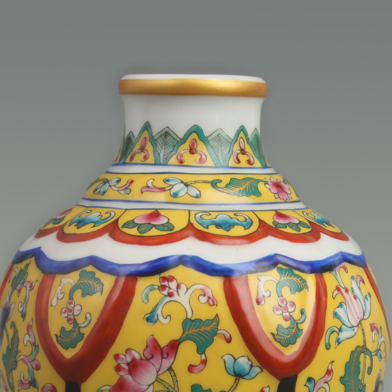 RARE FAMILLE ROSE MEIPING VASE WITH YELLOW GROUND AND FLORAL MOTIFS: Qing Dynasty Qian Long Period; High: 8.0 inch; Width: 5.5 inch; Wooden base for diplay only
