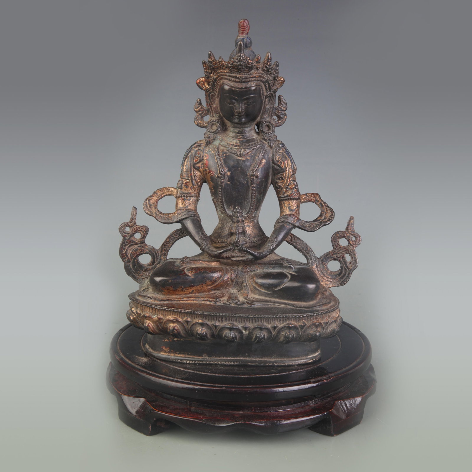 A FINE BRONZE LONGEVITY BUDDHA FIGURE: Qing Dynasty; Width: 5.2 inch; High: 8.3 inch; Wooden base for diplay only