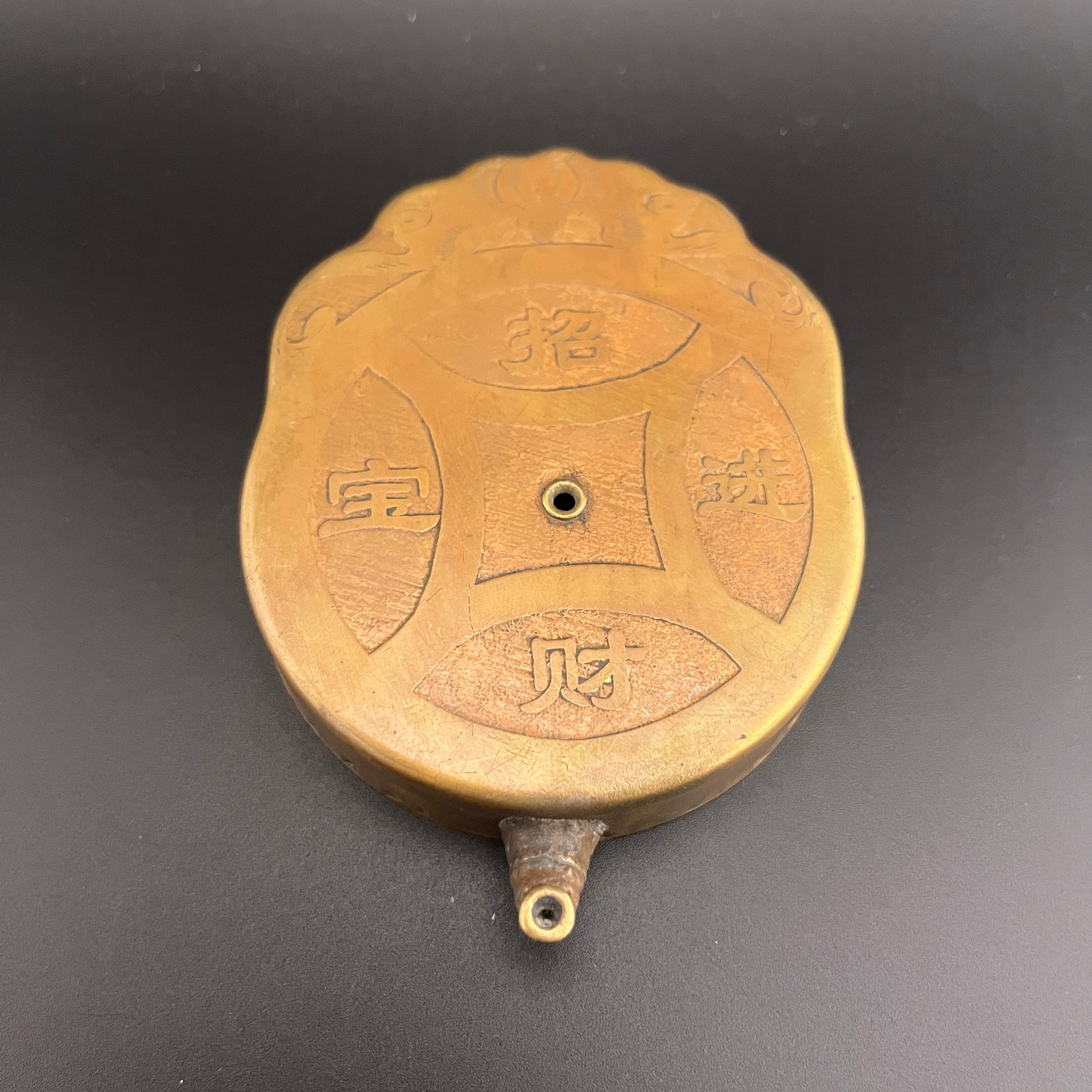 A FINELY CARVED BRONZE WATER DROPPER WITH ZHAO CAI JIN BAO MARK