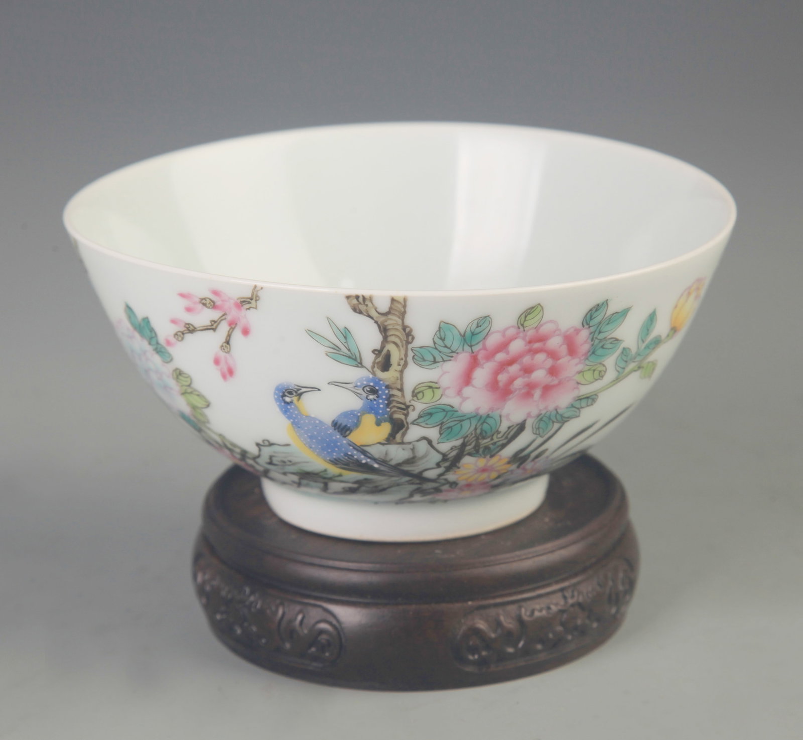RARE FAMILLE ROSE PORCELAIN BOWL WITH MAGNOLIA AND PEONY DECORATION: Qing Dynasty Yong Zheng Period; High: 2.5 inch; Diameter: 5.5 inch; Wooden base for diplay only