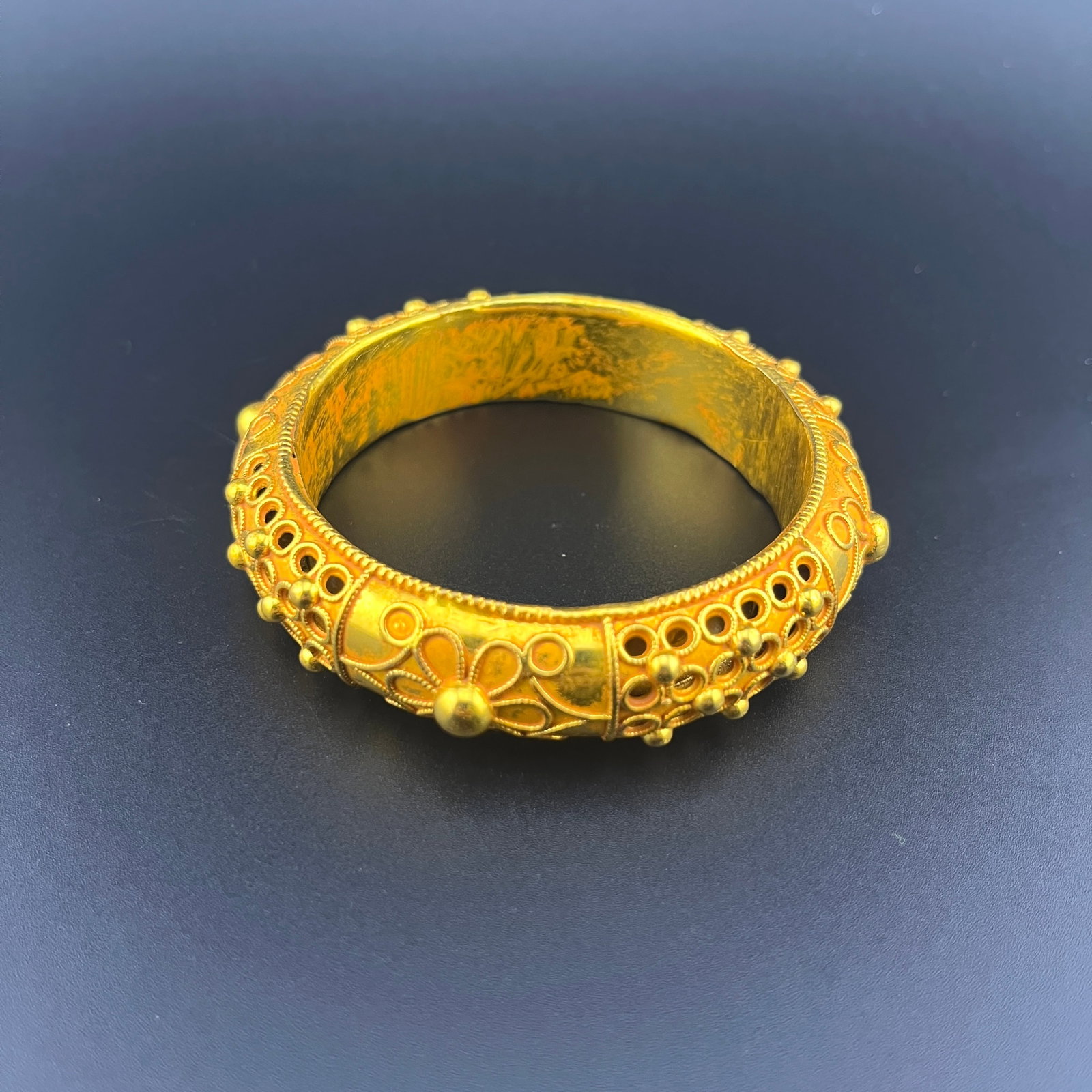 A FINE GILT BRONZE DRAGON BANGLE