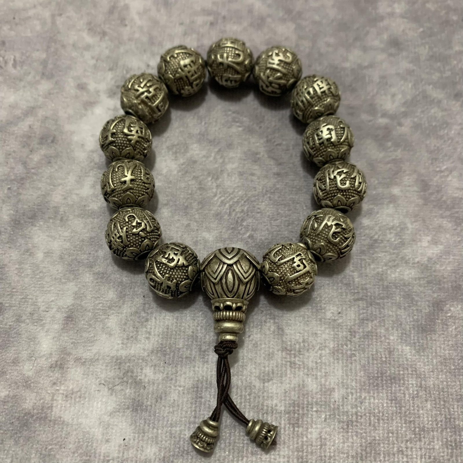 A FINE WHITE BRONZE FINELY CARVED BRACELETS