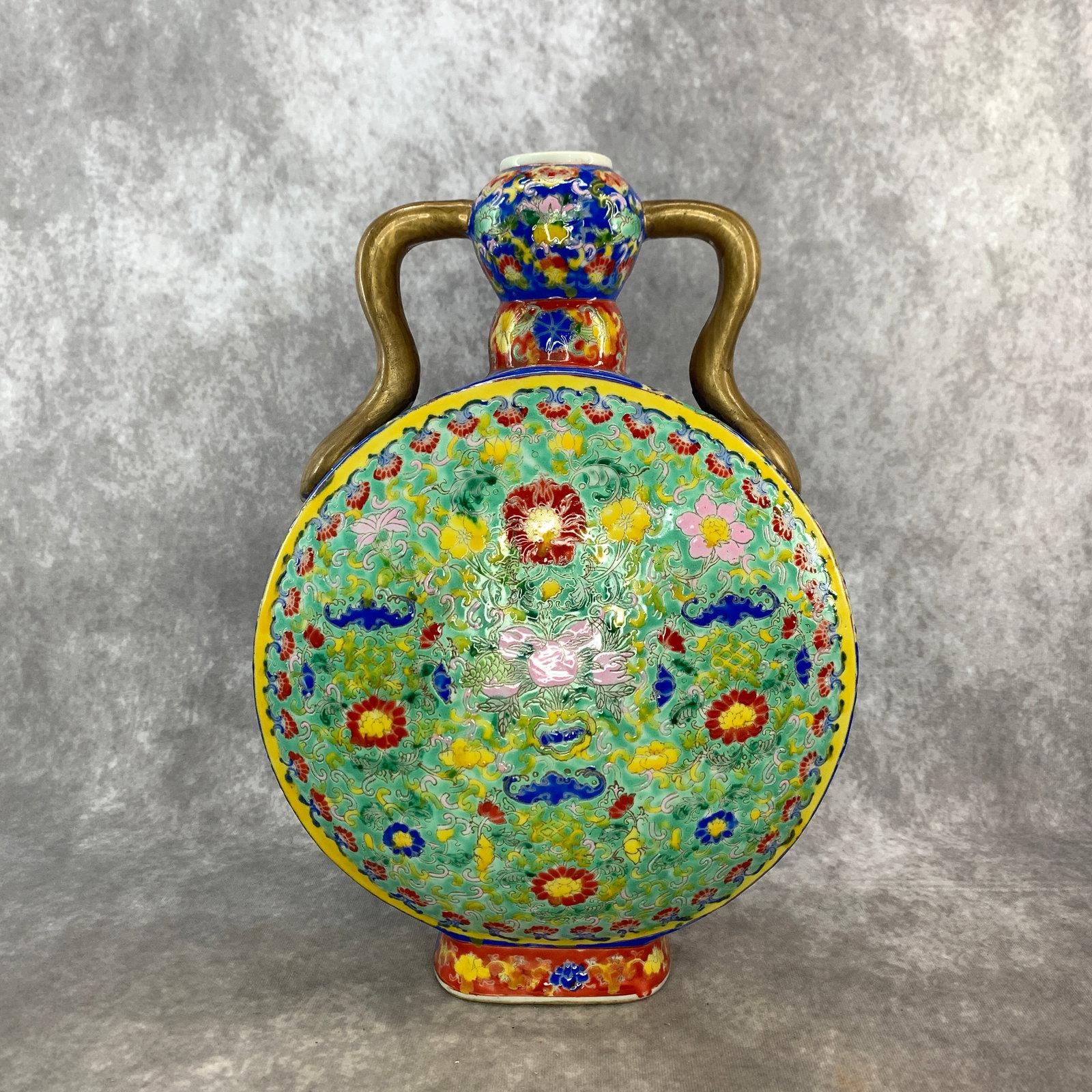 GREEN GROUND FAMILLE ROSE BATS AND LOTUS PORCELAIN MOONFLASK