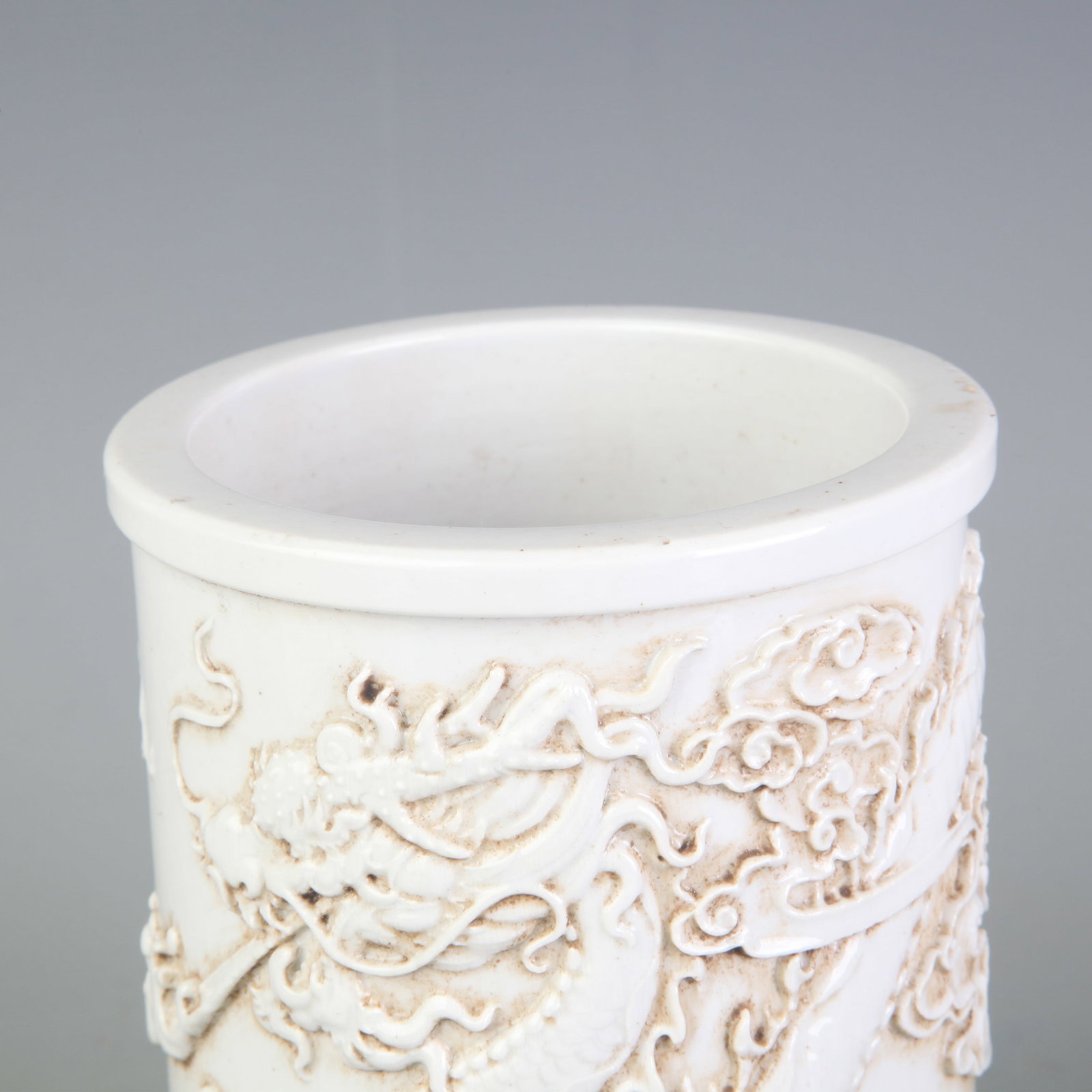 WHITE PORCELAIN BRUSH POT CARVED WITH DRAGON PATTERNS (1 of 5)