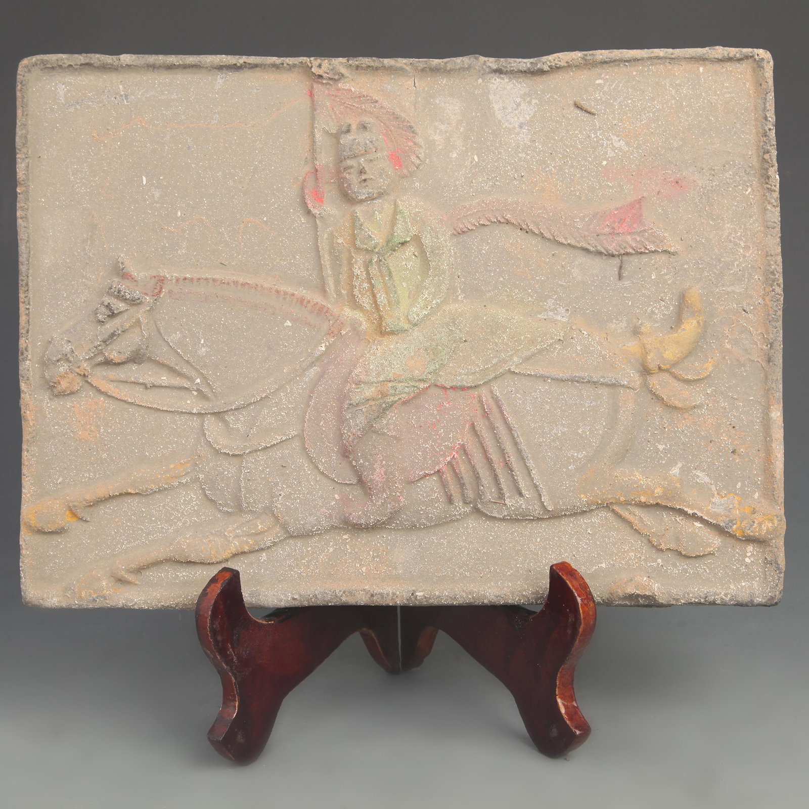 TANG DYNASTY-STYLE TILE CARVING WITH A PERSON PLAYING BALL