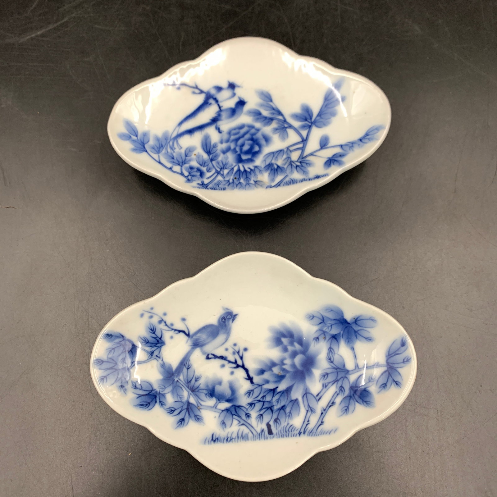A PAIR OF FINE BLUE AND WHITE 'BIRDS AND PEONY' MINIATURE DISHES