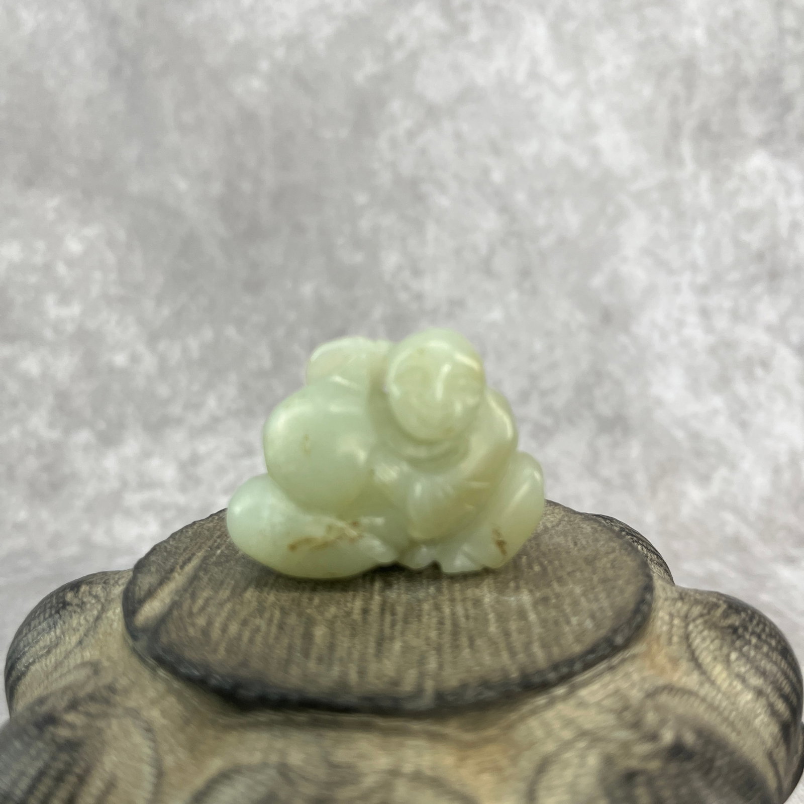 FINE HAND-CARVED JADE FIGURINE OF BOY: Qing Dynasty; Long: 1.65 inch; Width: 1.3 inch; High: 0.8 inch