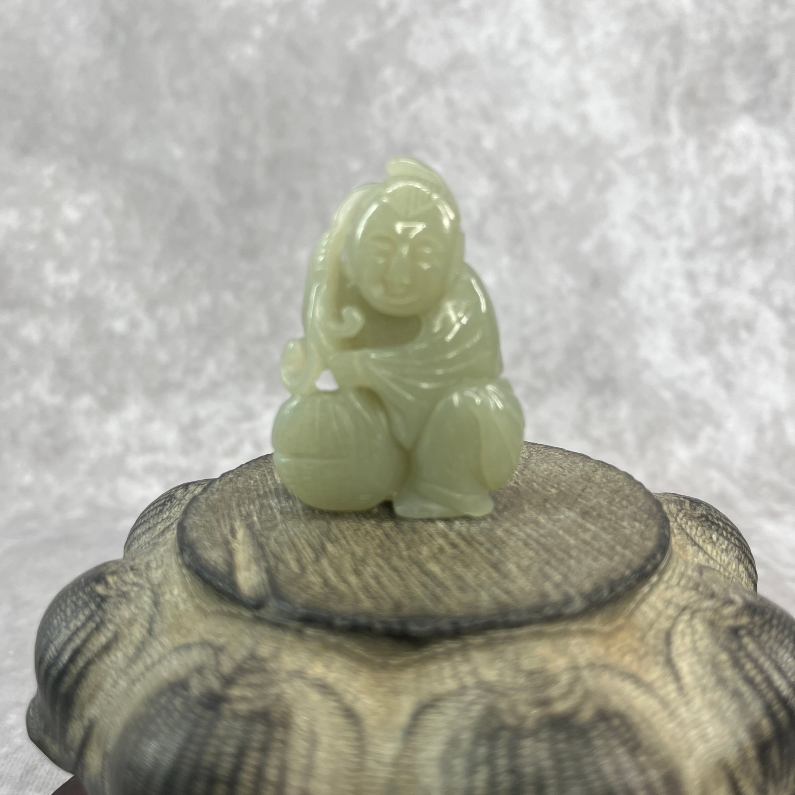 FINE HAND-CARVED JADE FIGURINE OF BOY: Qing Dynasty; Long: 2 inch; Width: 1.48 inch; High: 0.63 inch