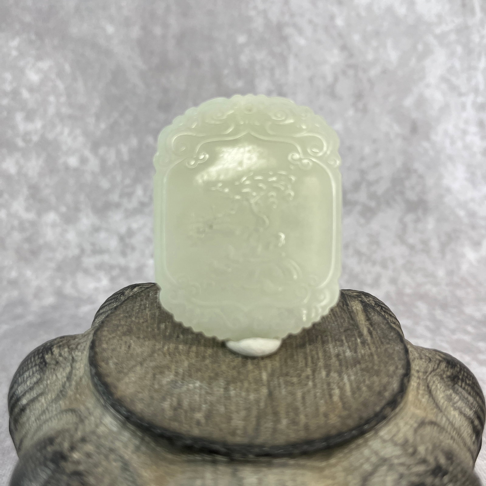WHITE JADE 'BOY AND LOTUS' OPENWORK PLAQUE PENDANT