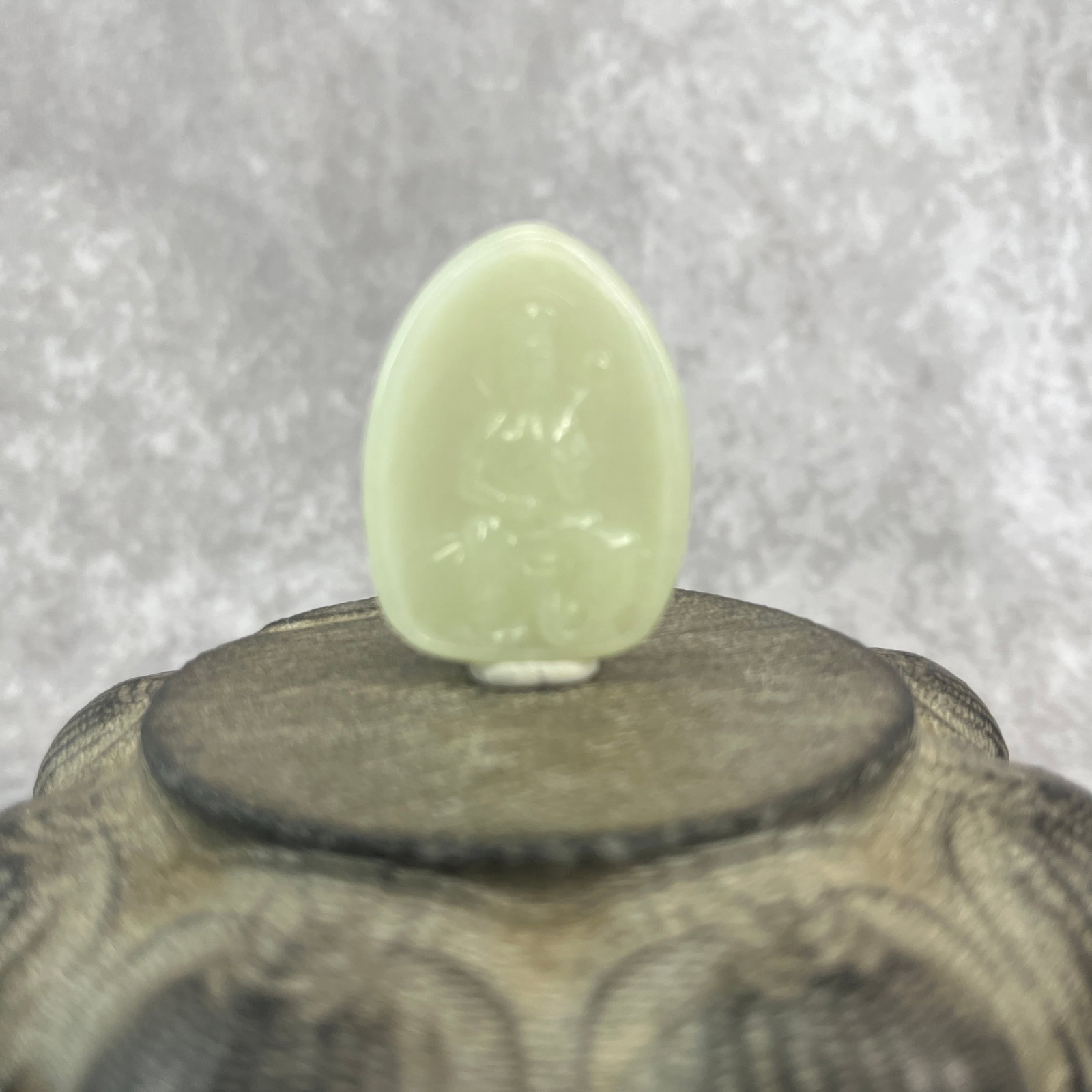 HAND-CARVED JADE AMULET PLAQUE OF GUANYIN: Qing Dynasty; Long: 1.63 inch; Width: 1.22 inch; High: 0.22 inch