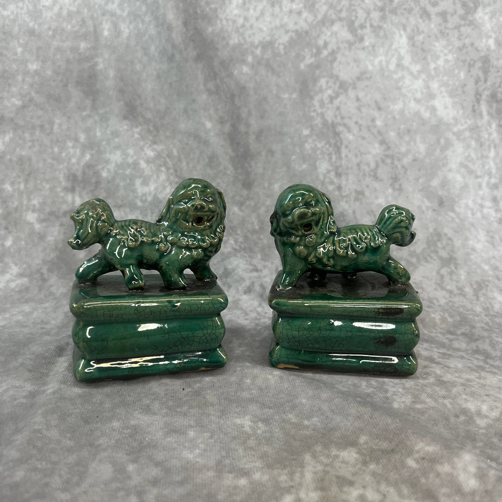 PAIR OF GREEN GLAZED CERAMIC GUARDIAN LION (FOO DOG)