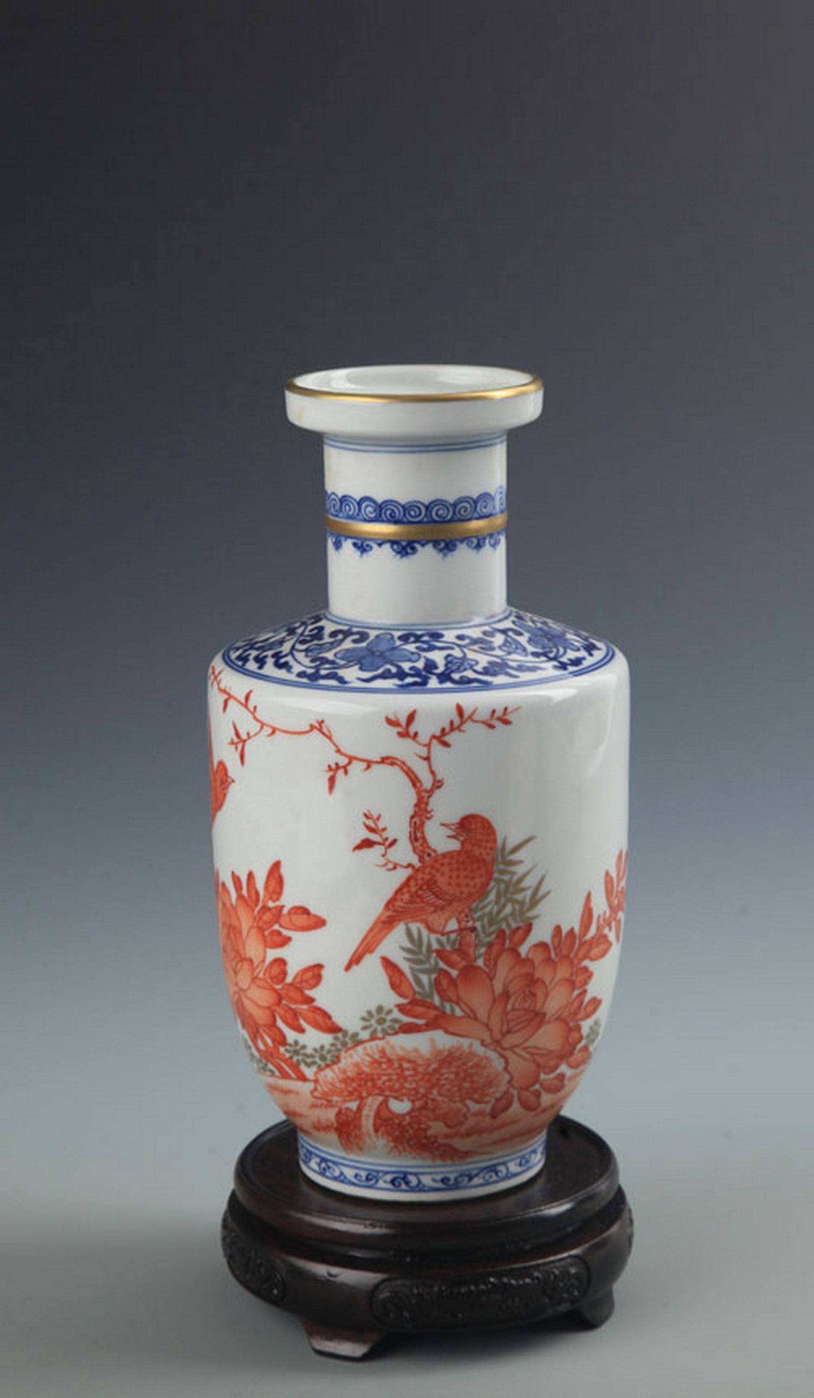 RARE BLUE AND WHITE FLOWER AND BIRD PATTERN PORCELAIN VASE: Qing Dynasty; High: 8.5 inch; Diameter: 2.5 inch; Wooden base for diplay only