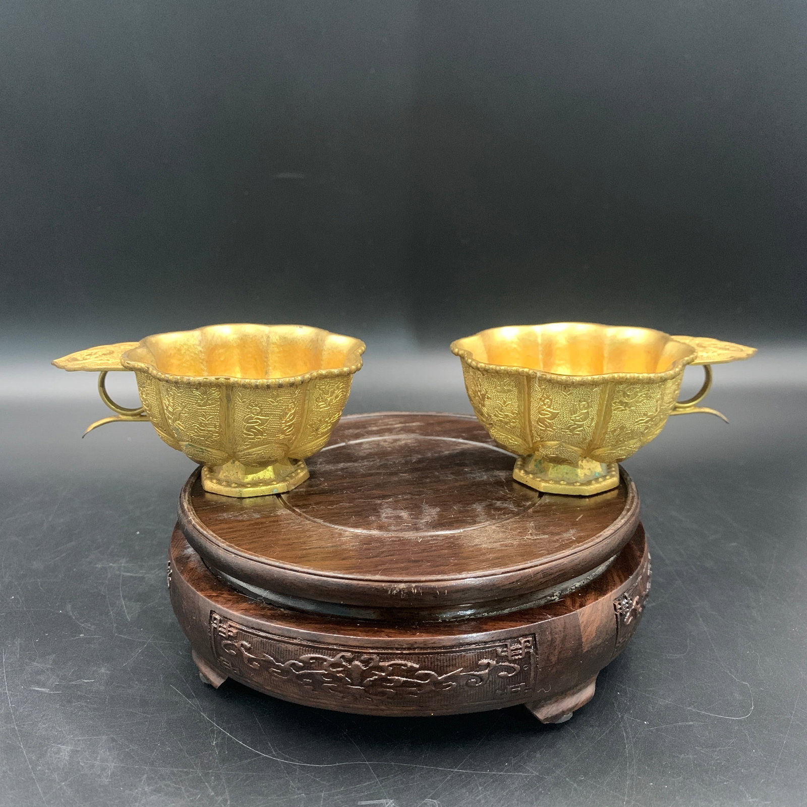 PAIR OF FINE GILT-BRONZE MELON-LOBED SINGLE-HANDLED CUPS