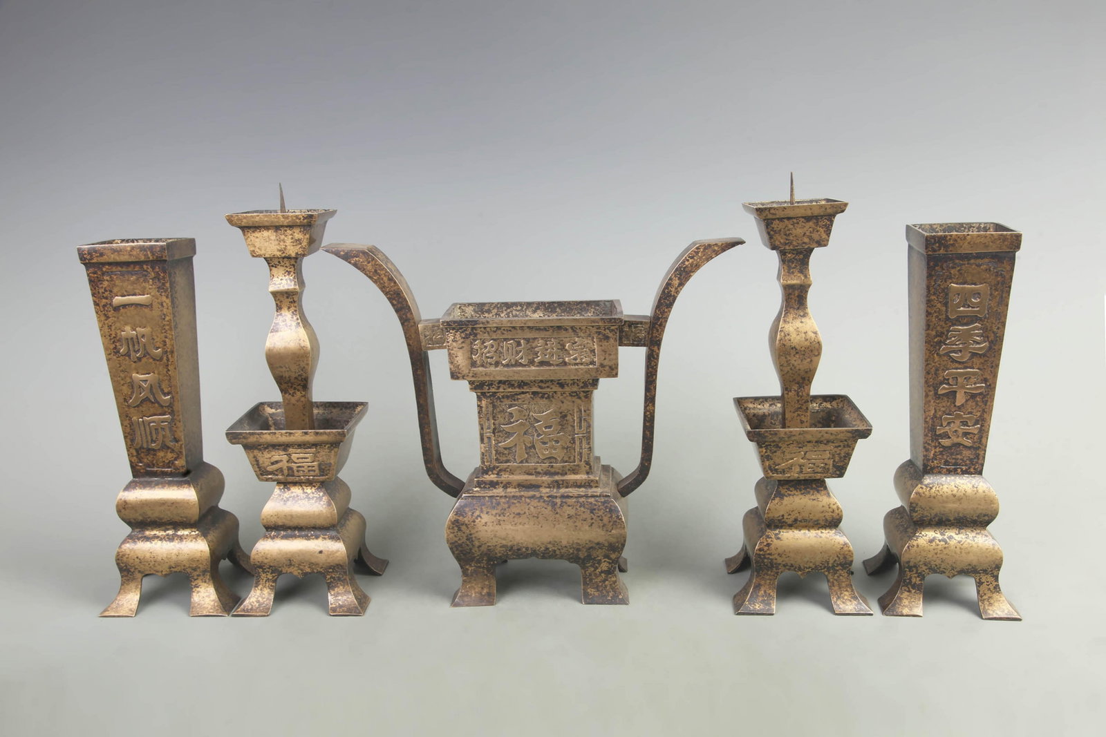 RARE SET OF GILT BRONZE FIVE PIESE ALTAR GARNITURE SET (WU GONG): Qing Dynasty; High: 12 inch; Width: 3.2 inch; Long: 10 inch; Wooden base for diplay only