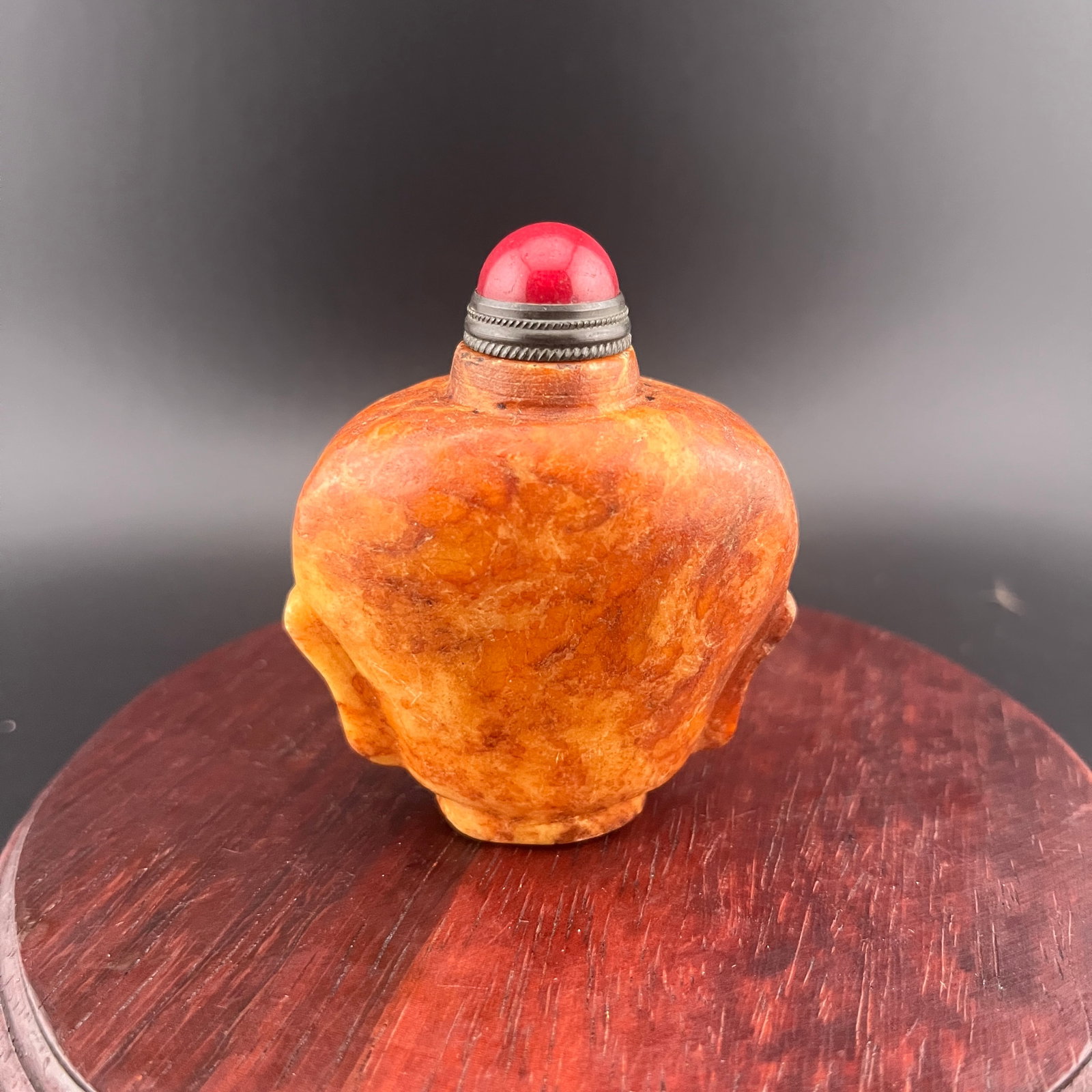 A FINE JADE MADE SNUFF BOTTLE: Modern; Long: 2.2 inch; Width: 1.21 inch; High: 2.59 inch; Wooden base for diplay only