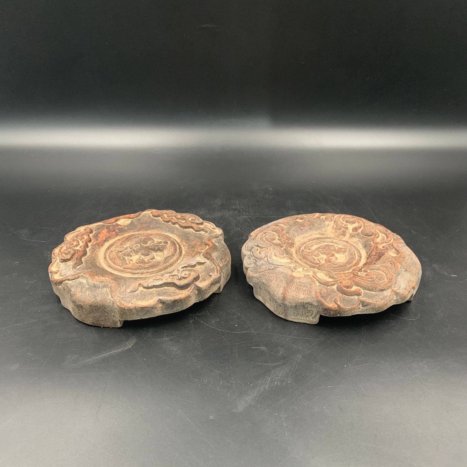 A PAIR OF FINE CARVED HARDWOOD LOBED CIRCULAR DISPLAY STANDS