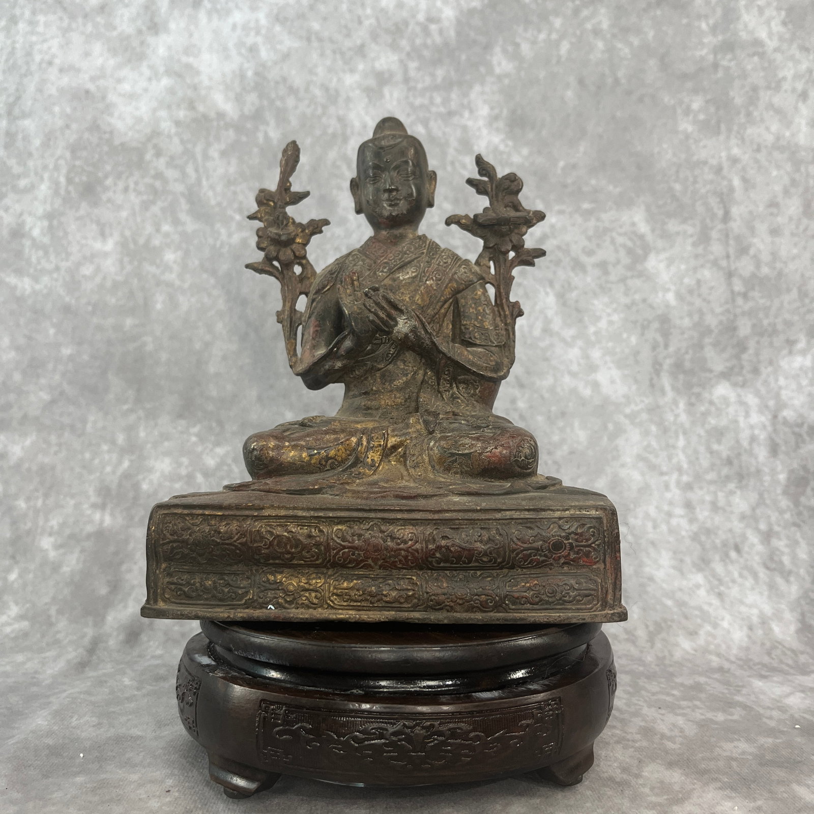 A FINE BRONZE JE TSONGKHAPA STATUE: Qing Dynasty Style; Long: 4.9 inch; Width: 4.1 inch; High: 8.3 inch; Wooden base for diplay only