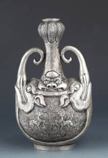 A FINELY CARVED AND UNUSUAL KETTLE: Tang Dynasty, H: 10.2 in x W: 5.9 in