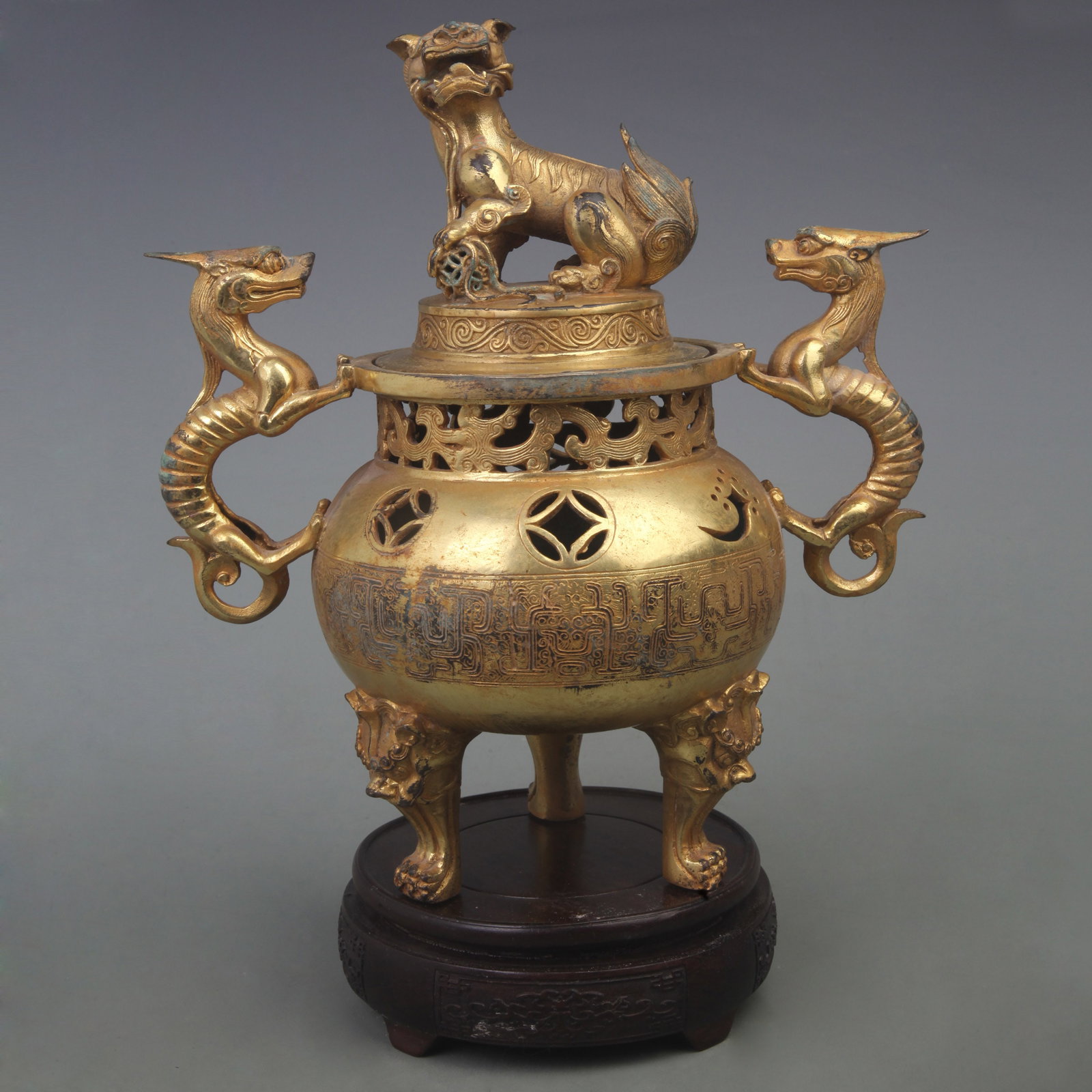 A FINE RUI SHOU STYLE THREE FOOT BRONZE INCENSE CENSER: Ming Dynasty Style; Diameter: 9.0 inch; High: 10.0 inch; . Wooden base for display only