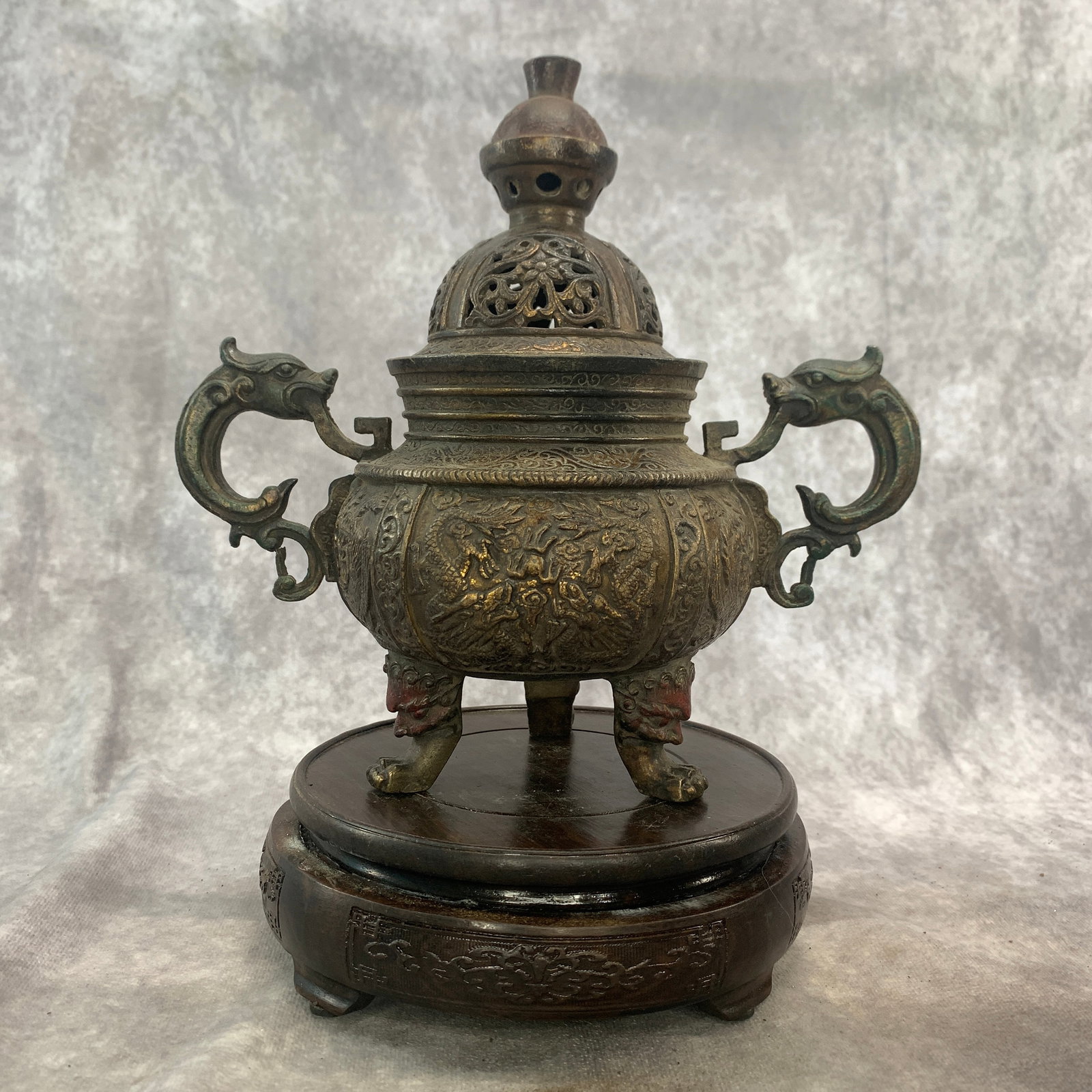 CHINESE ARCHAISTIC BRONZE DRAGON-HANDLED ALTAR CENSER: Qing Dynasty; Long: 8.7 inch; Width: 4.9 inch; High: 8.5 inch; . Wooden base for display only