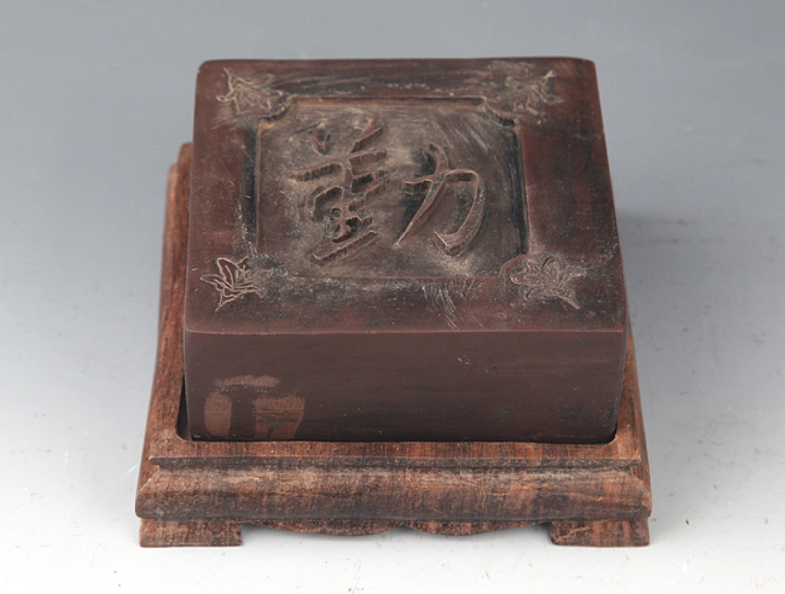 A DETAIL AND FINELY CARVED BRONZE TIBETAN BUDDHA: 20th Century; High: 11.25 inch; Width: 4.0 inch; . Wooden base for display only