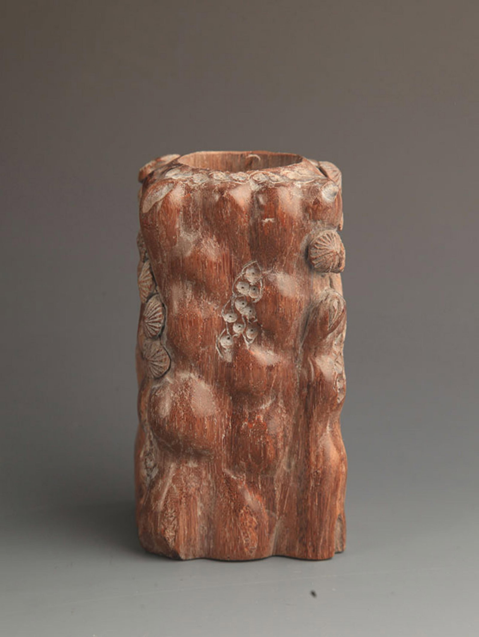 LONGAN WOOD PINE TREES PATTERN CARVED PEN HOLDER: Republic Period; High: 4.75 inch Width: 2.25 inch . Wooden base for display only