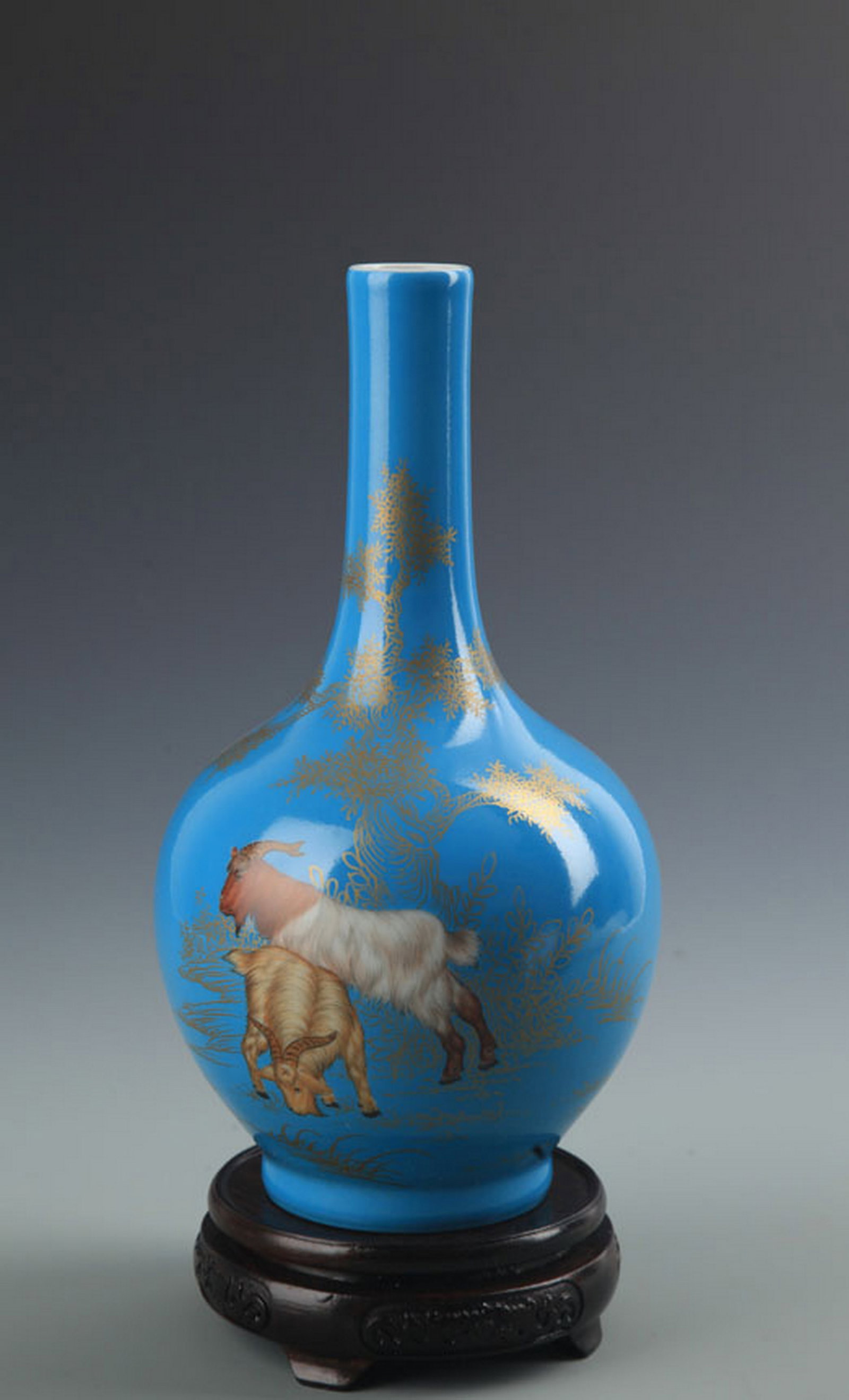 RARE BLUE COLOR GLAZED SHEEP PATTERN PORCELAIN BOTTLE: Qing Dynasty; High: 9.5 inch; Diameter: 1.5 inch; . Wooden base for display only