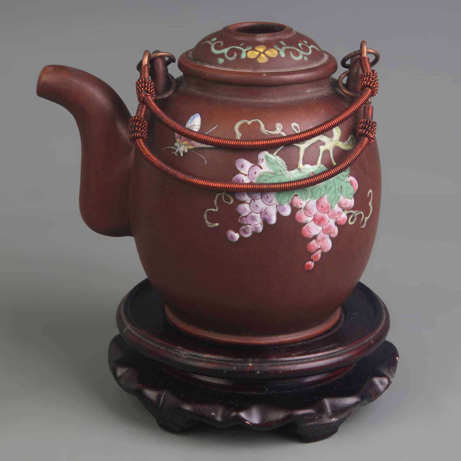 TEAPOT WITH OVERHEAD HANDLE, MULTICOLORED DECOR GU JING ZHOU: Modern; Diameter: 3.0 inch; Width: 5.7 inch; High: 7.0 inch. Wooden base for display only