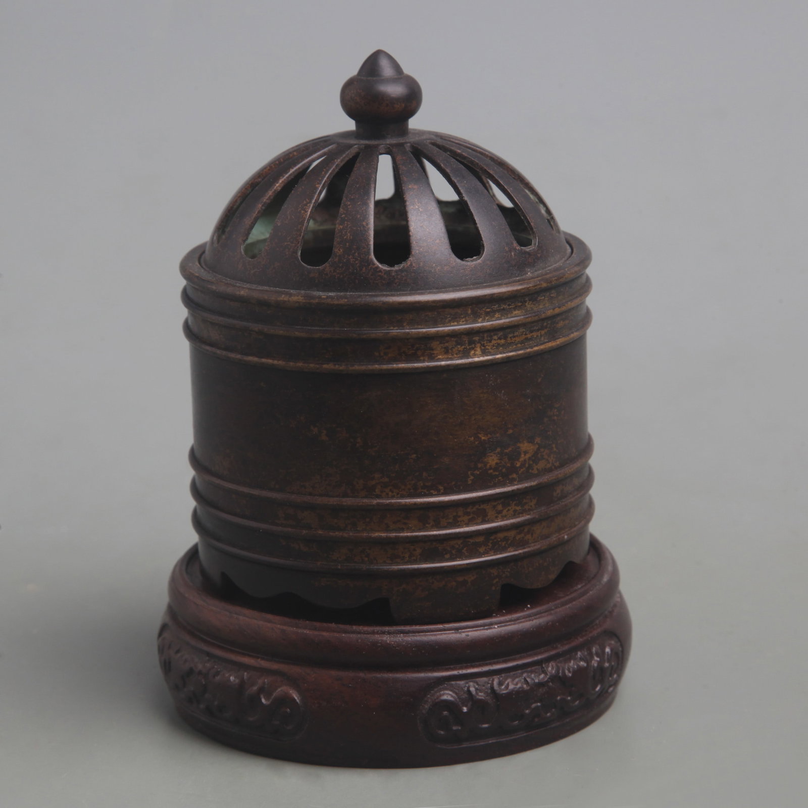 A FINE BRONZE CAGE STYLE CENSER: Ming Dynasty Style; Diameter: 3.1 inch; High: 4.1 inch; . Wooden base for display only