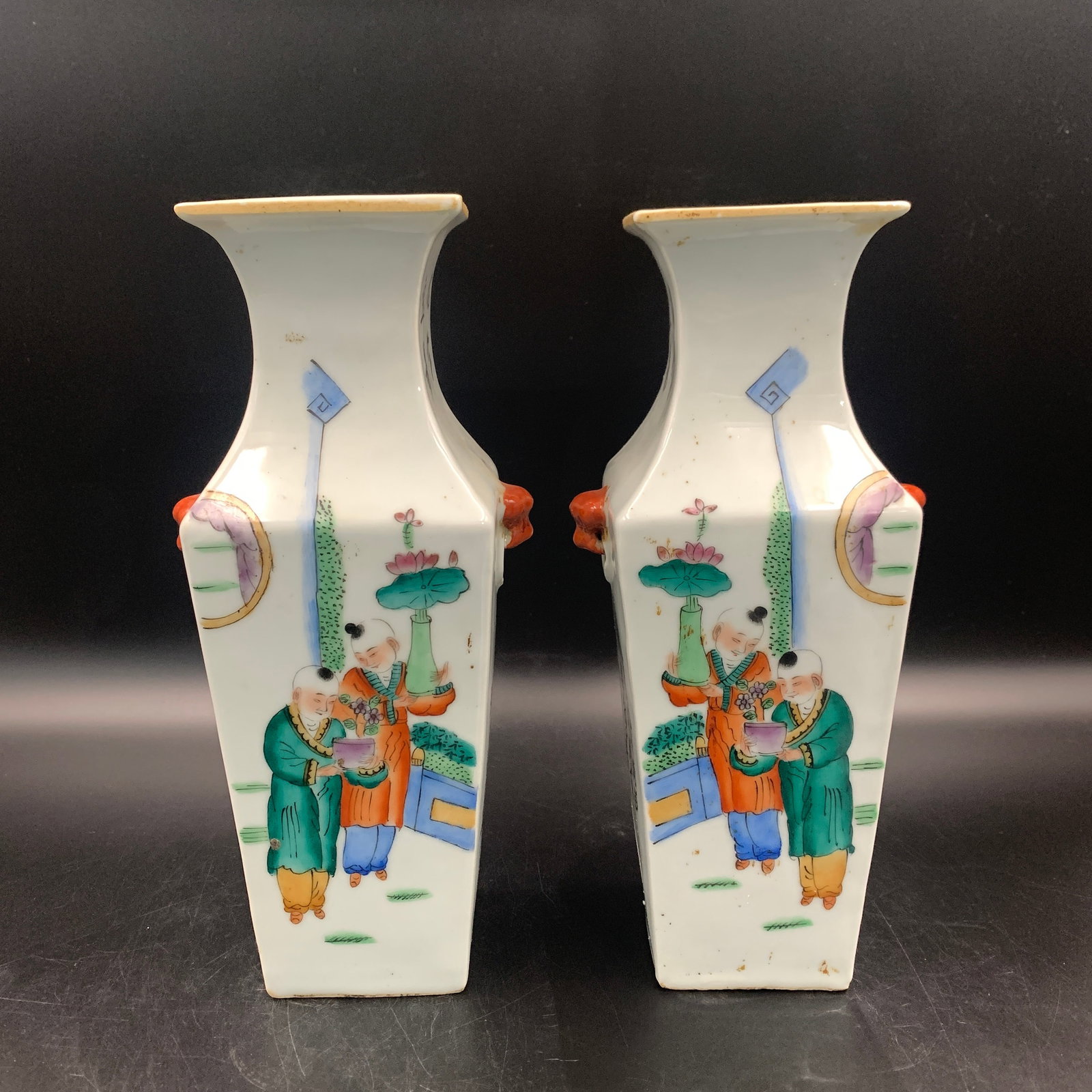 PAIR OF FAMILLE ROSE "BOYS AT PLAY" SQUARE VASES: Republic Period; Long: 4.7 inch; Width: 3.8 inch; High: 10.5 inch; . Wooden base for display only