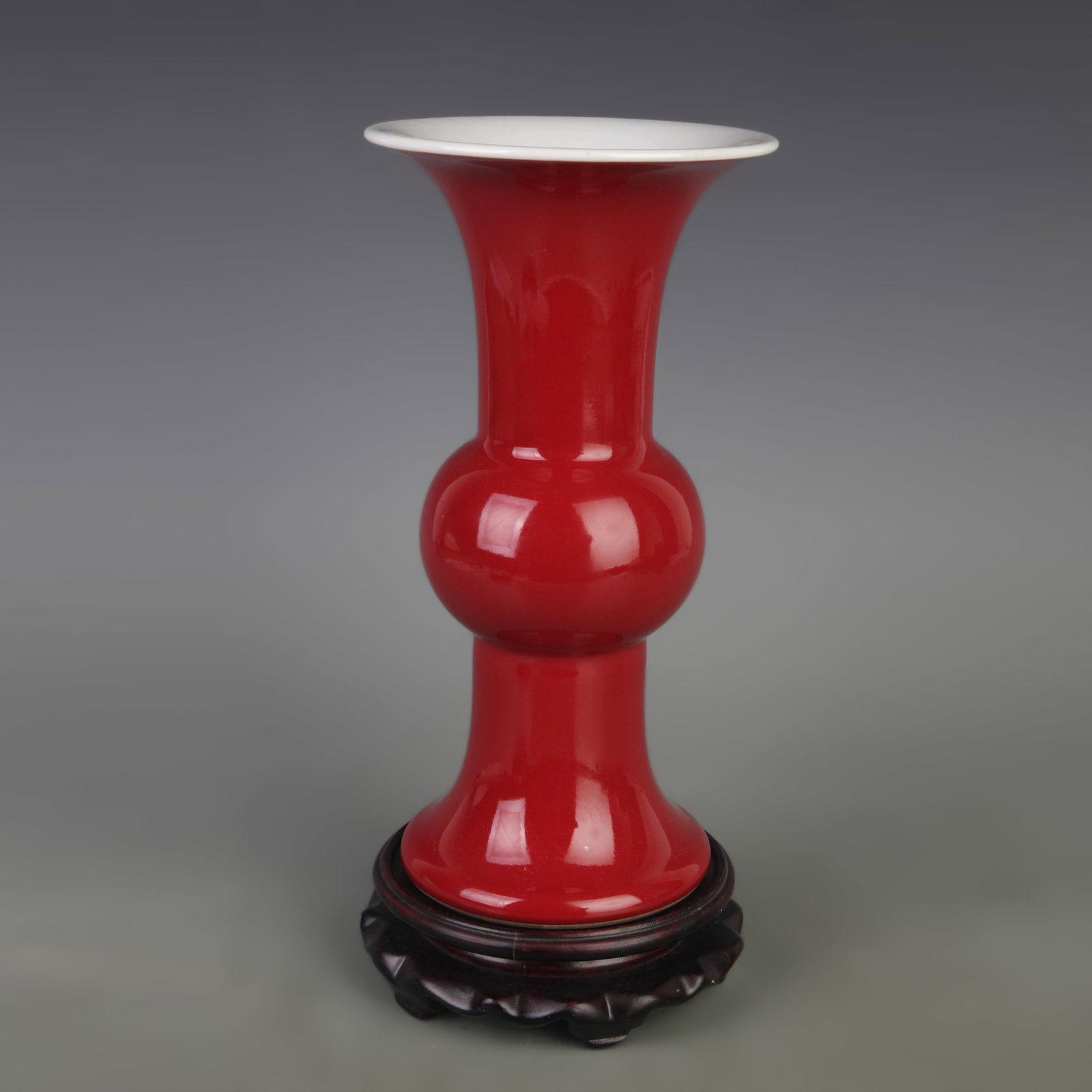RED COLOR GLAZED FLORAL PORCELAIN VASE: Qing Dynasty Qian Long Period; Diameter: 5.1 in; High: 9.8 in. Wooden base for display only