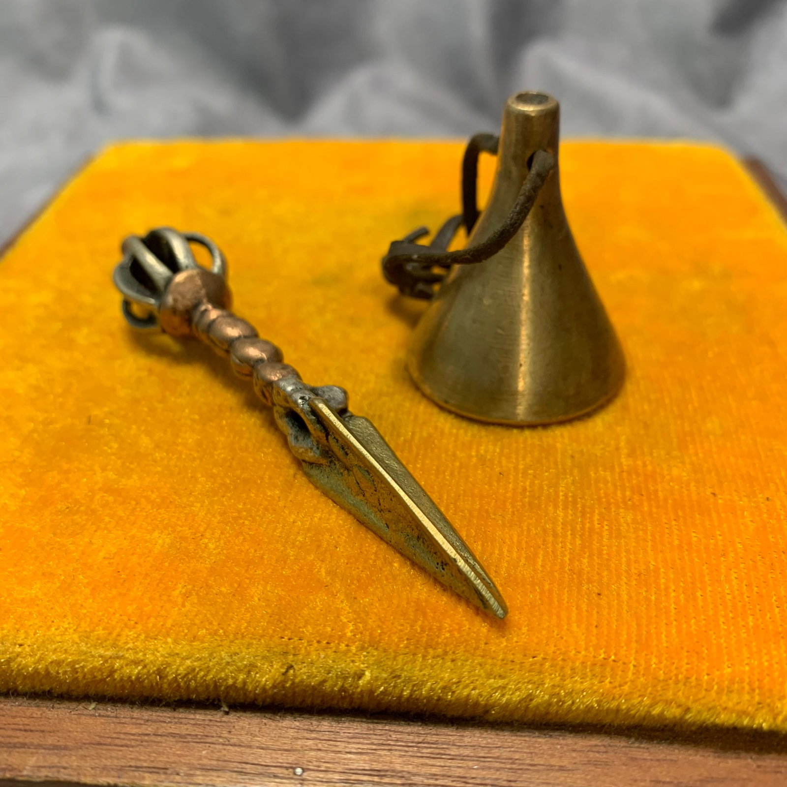 TIBETAN BUDDHIST BRONZE RITUAL ITEM: Qing Dynasty; Long: 5 inch; Width: 1.4 inch; H; 1.4 inch; . Wooden base for display only