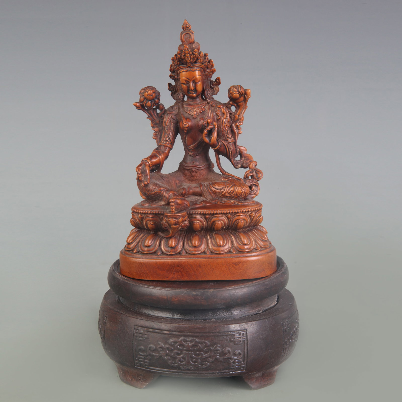 A FINE BOXWOOD MADE GREEN TARA BUDDHA STATUE: Qing Dynasty; High: 4.7 inch; . Wooden base for display only
