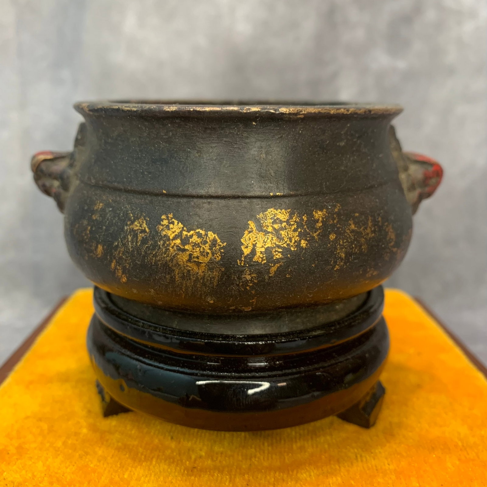 A ROUND LION EAR STYLE BRONZE CENSER: Modern; High: 1.9 inch; Diameter: 3.5 inch; . Wooden base for display only