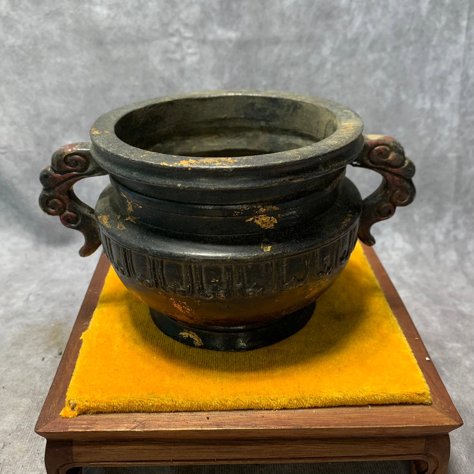 XUAN DE STYLE GILDED BRONZE RUYI-EARED INCENSE BURNER: Ming Dynasty Style; High: 3.6 inch; Diameter: 6.6 inch; . Wooden base for display only