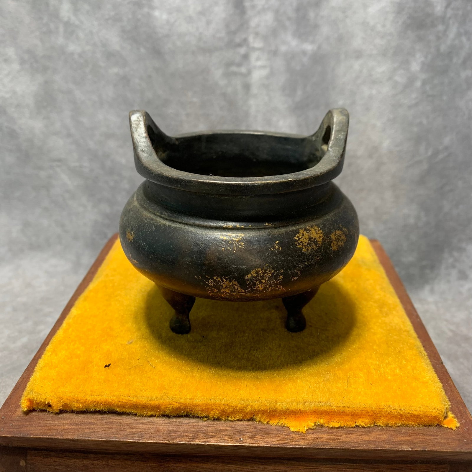 GILT BRONZE TRIPOD INCENSE BURNER, XUANDE PERIOD: Ming Dynasty Style; High: 3.5 inch; Diameter: 3.7 inch; . Wooden base for display only