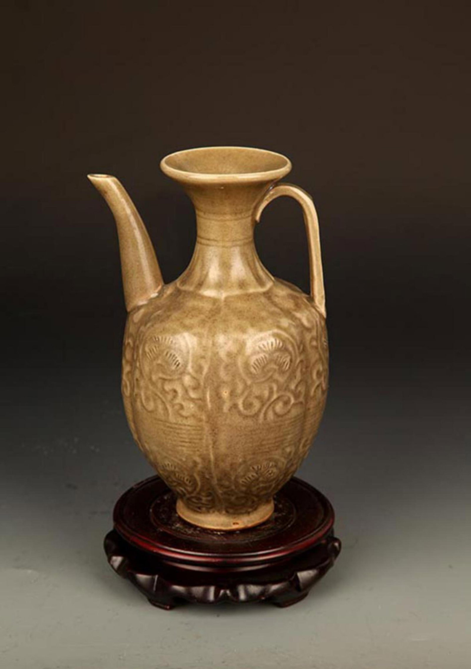 A "YAO ZHOU YAO" MELON SHAPE WATER JAR: Song Dynasty Style; High: 7.5 inch; Width: 4.75 inch; Diameter: 2.5 inch; . Wooden base for display only
