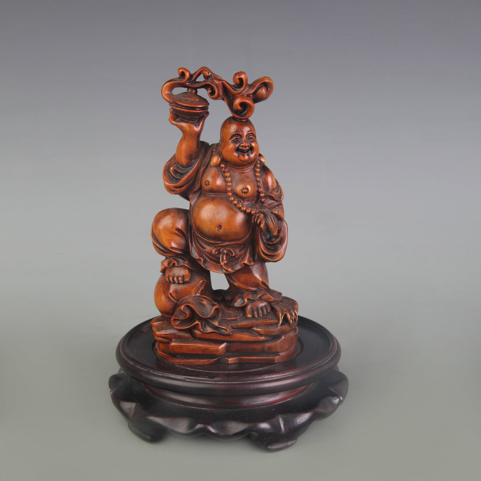 A FINE BOXWOOD MAITREYA BUDDHA STATUE: Qing Dynasty; High: 5.8 inch; . Wooden base for display only