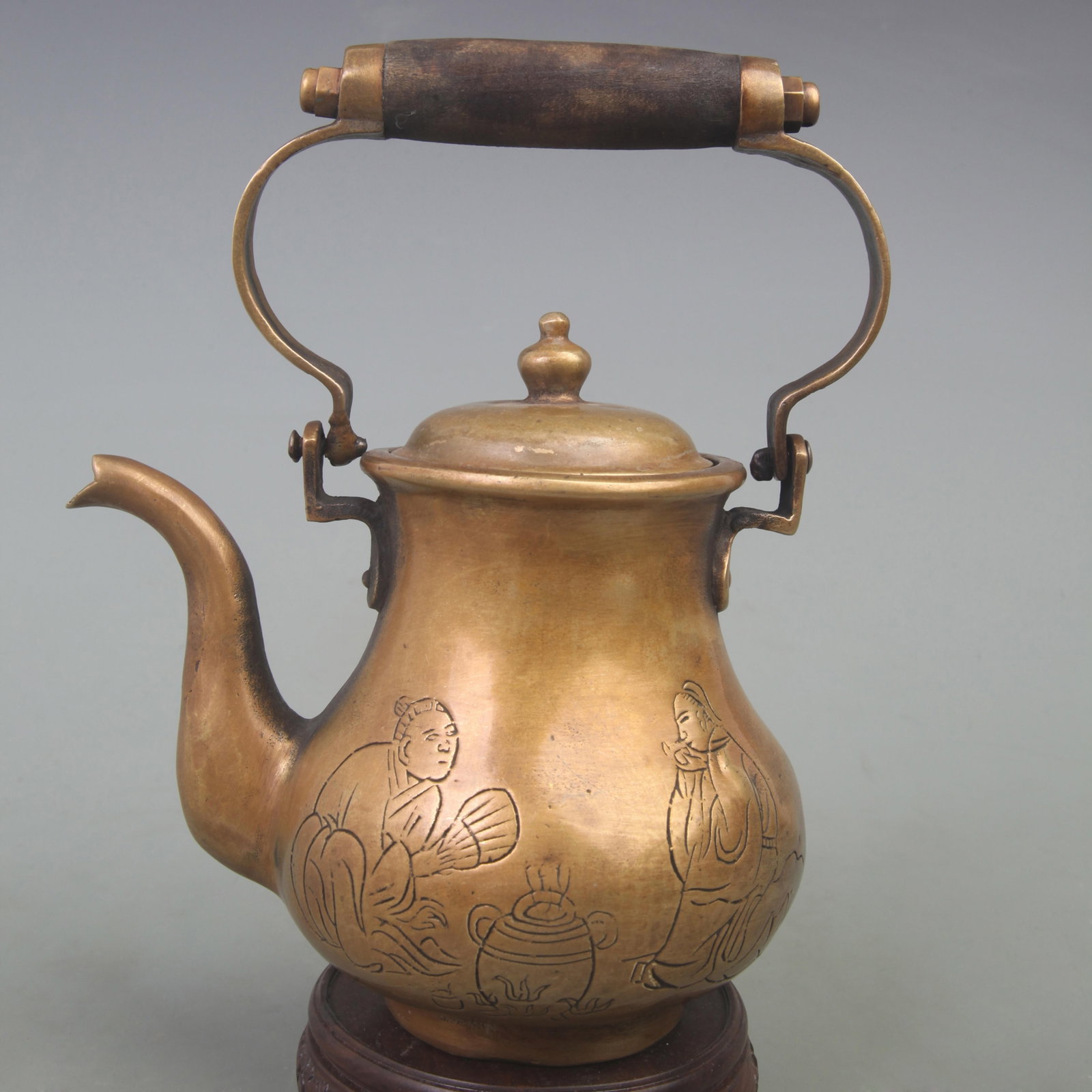 A BRONZE WATER POT WITH CHARACTER CARVING: Republic Period; High: 7.3 inch; High: 6 inch; . Wooden base for display only