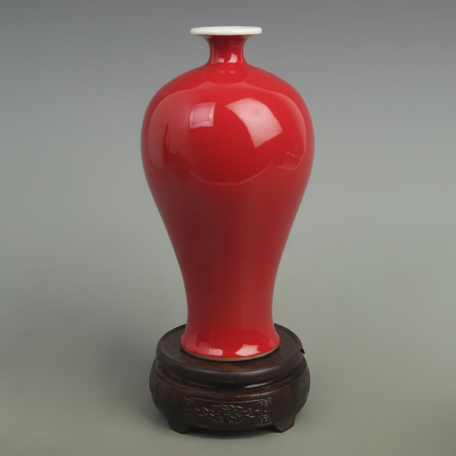 A FINE LANG RED GLAZED MEI STYLE PORCELAIN VASE: Qing Dynasty Qian Long Period; High: 9.00 inch; Width: 5.00 inch; wooden base for picture and display purpose only.