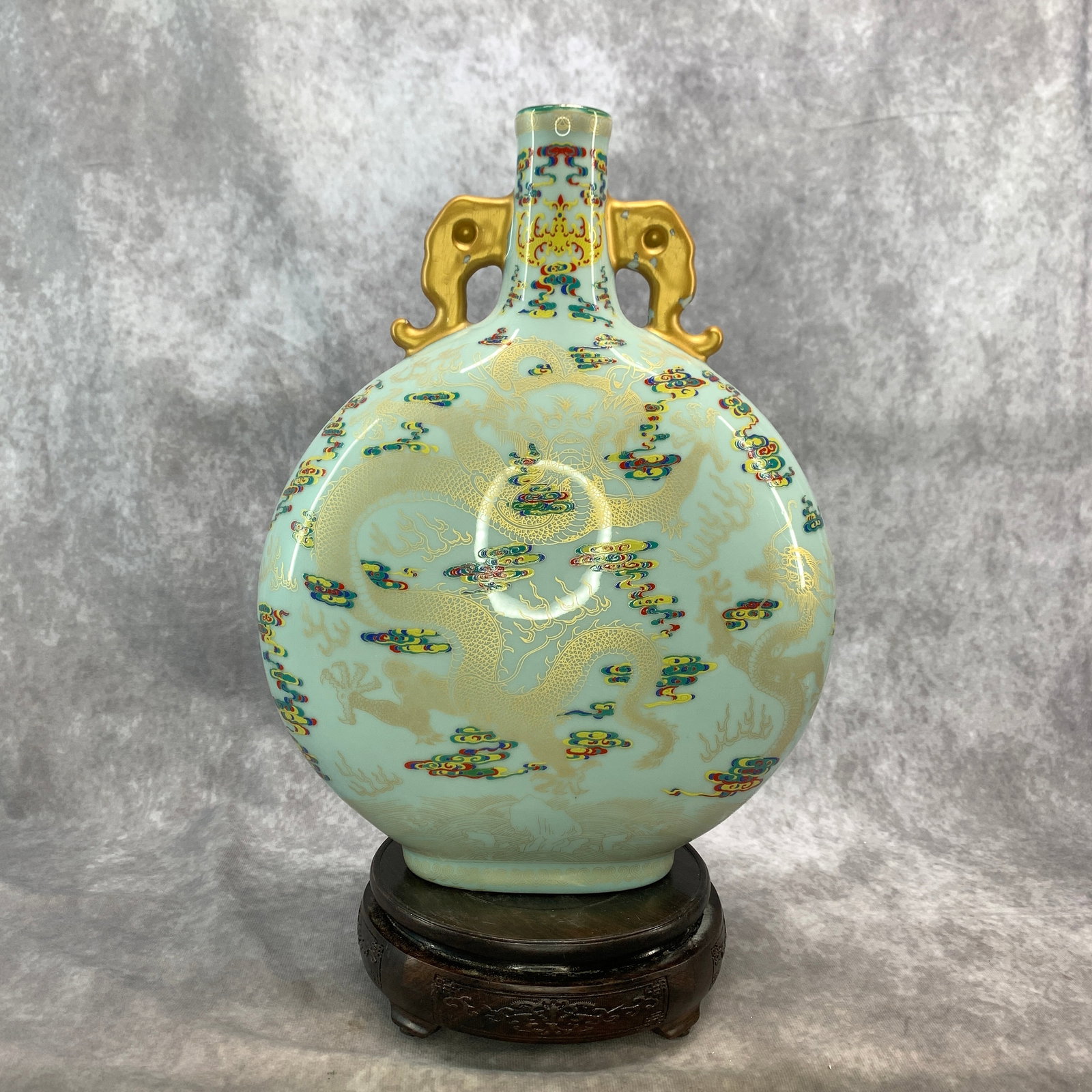 A FINE FAMILLE ROSE MOONFLASK PORCELAIN VASE (BAO YUE PING): Republic Period; Long: 10 inch; Width: 4.5 inch; High: 13.2 inch; wooden base for picture and display purpose only.