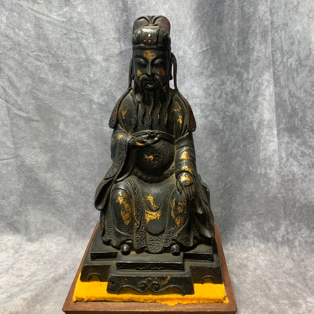 A GILT BRONZE WEALTH GOD FIGURE: Ming Dynasty Style; Long: 5.6 inch; High:10.2 inch; wooden base for picture and display purpose only.