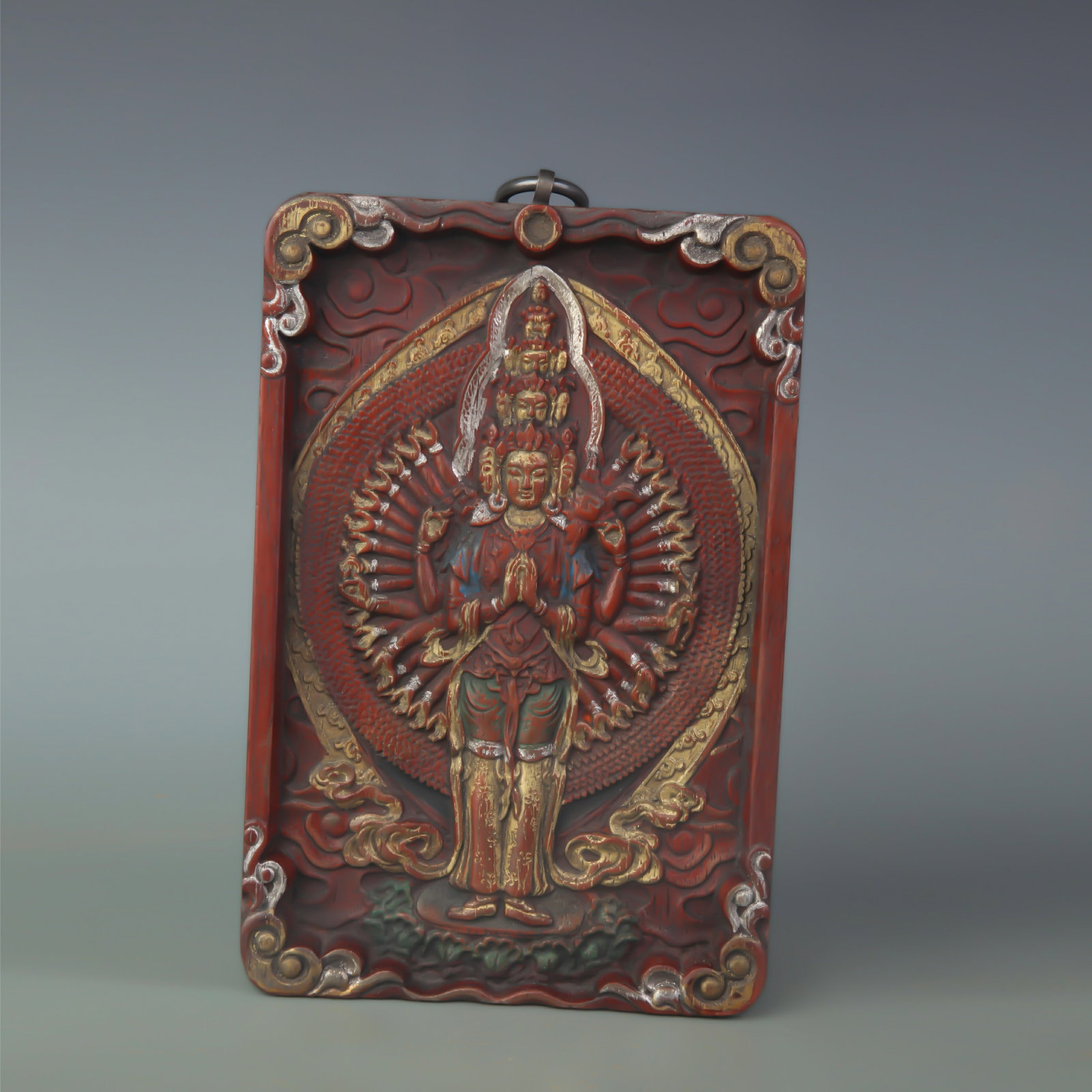 A CAMPHORWOOD CARVED HANGING PANEL OF THOUSAND-ARMED GUANYIN: Qing Dynasty; Long: 8.2 inch; Width: 5.5 inch
