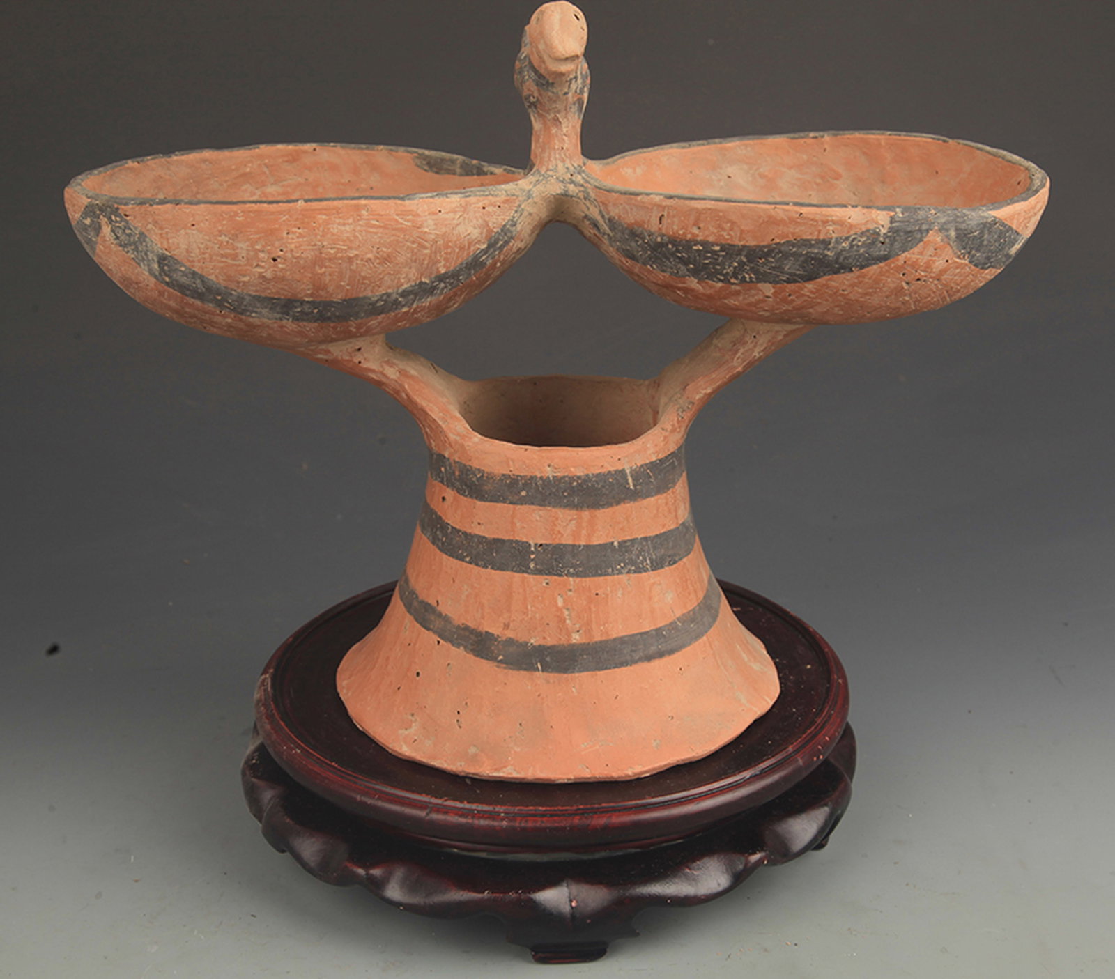 RARE MAJIAYAO CULTURE PAINTED POTTERY BIRD-FORM CANDLESTICK: New Stone Age Style; High: 8.5 inch; Long: 11.00 inch; wooden base for picture and display purpose only.