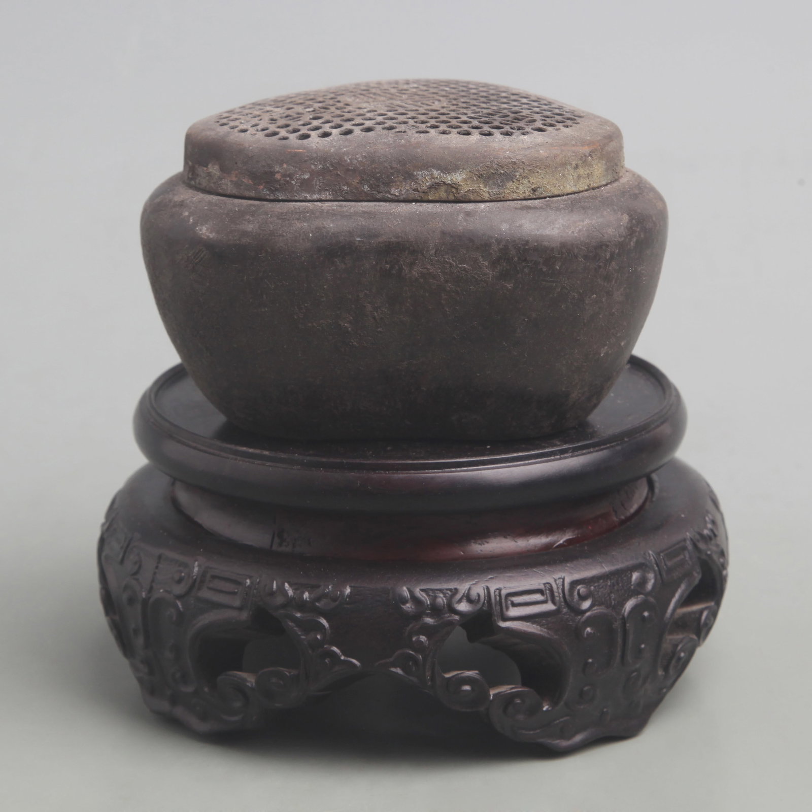 HOLLOWED-OUT INCENSE BURNER WITH THE CHARACTER PATTERN: Qing Dynasty; Diameter: 4.2 inch; High: 2.7 inch; wooden base for picture and display purpose only.