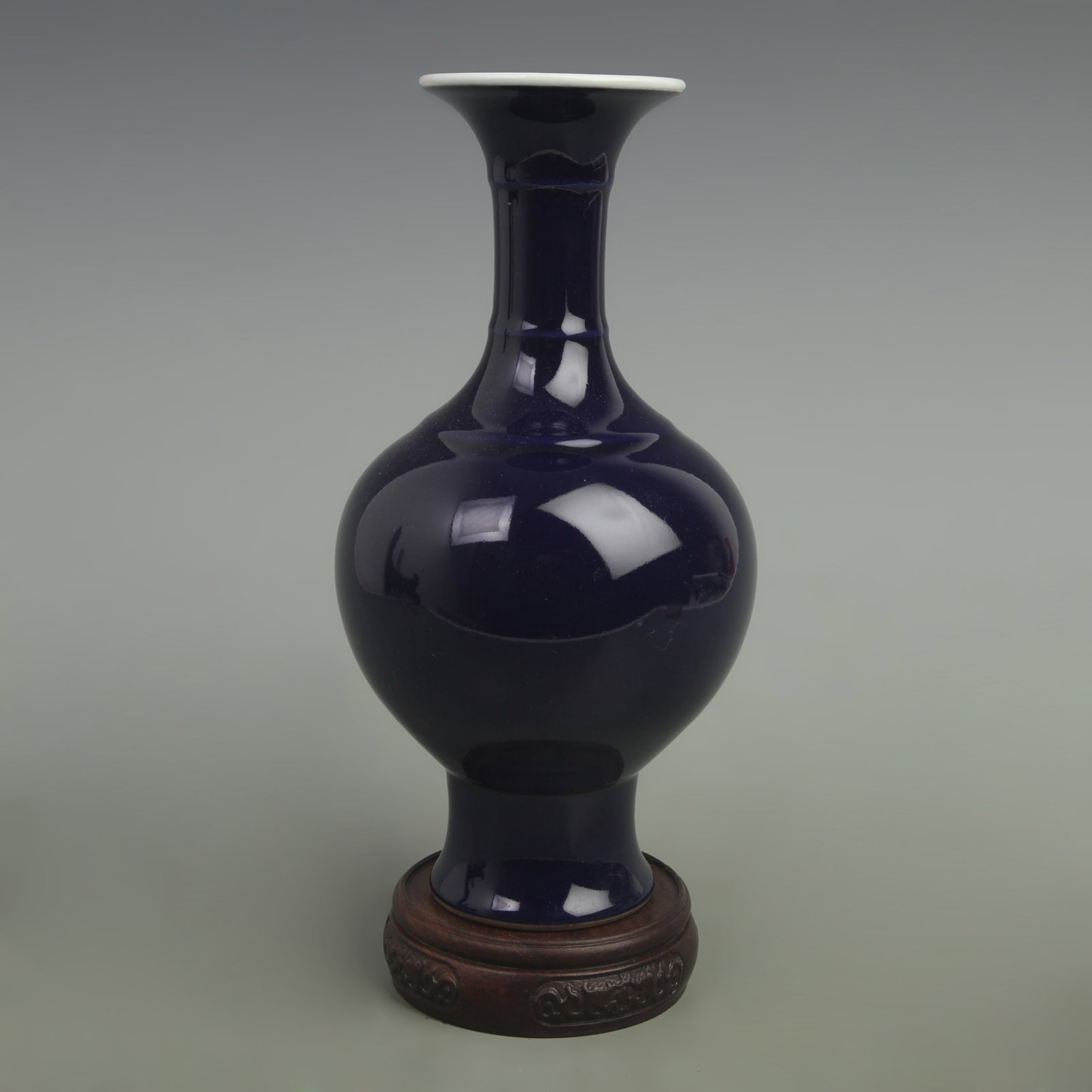 A FINE DARK BLUE COLOR GLAZED APPRECIATION PORCELAIN VASE: Qing Dynasty Qian Long Period; High: 10.2 inch; Width: 5.5 inch; wooden base for picture and display purpose only.